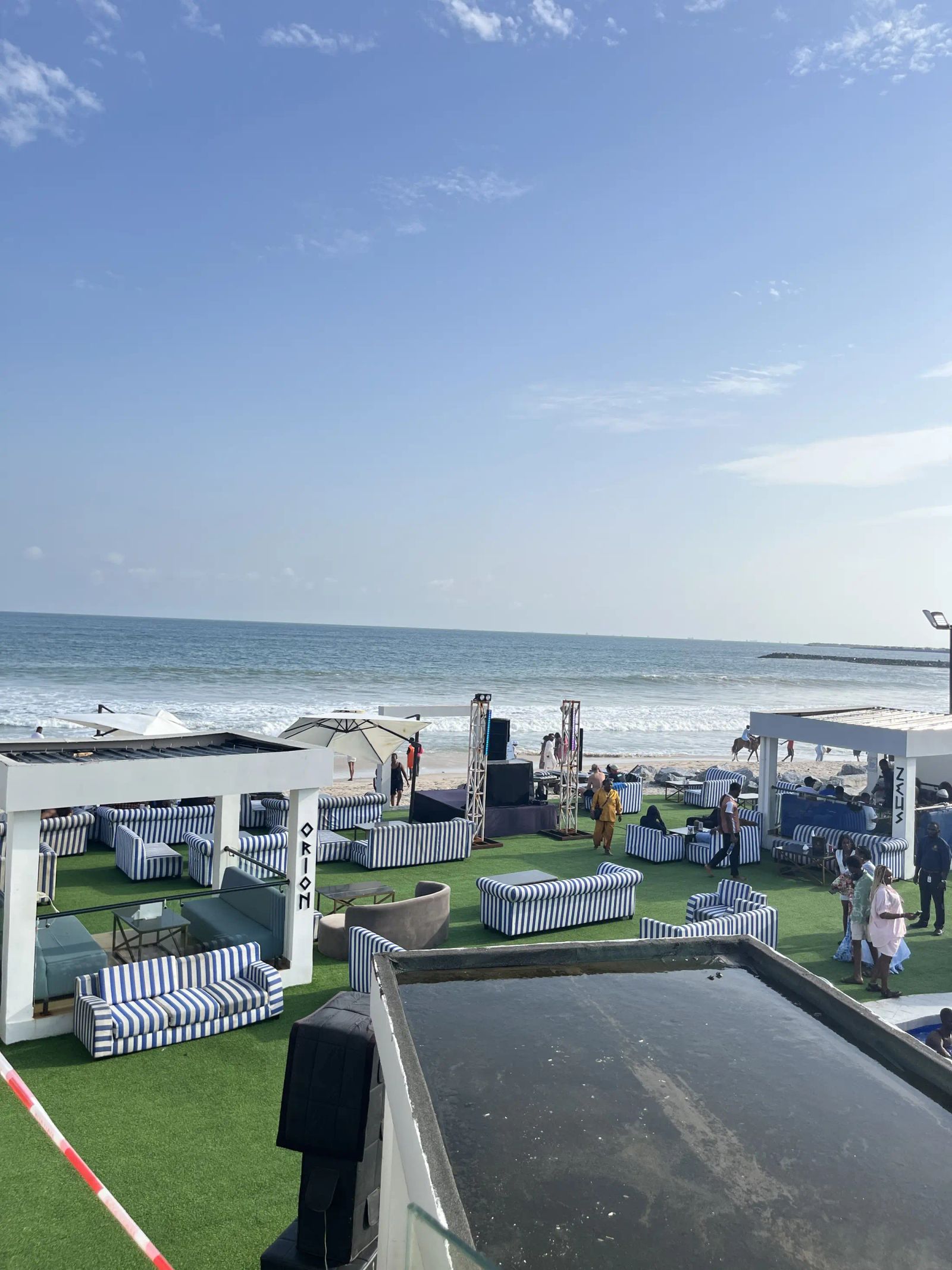 Looking over the pool and cabanas to the sea