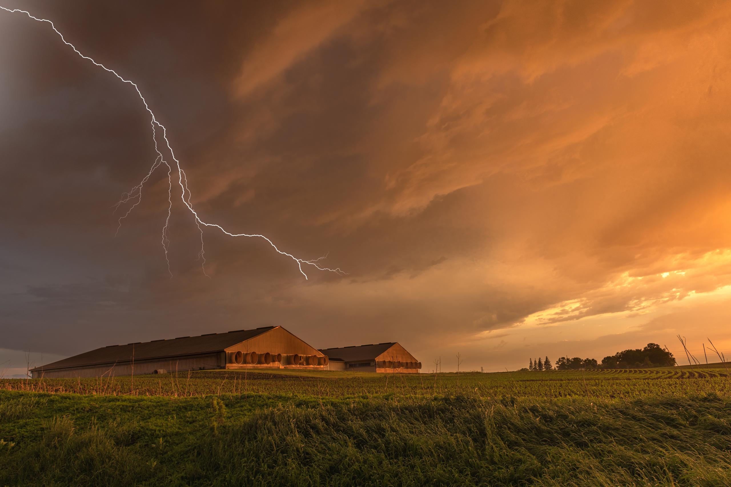 Lightning over barns