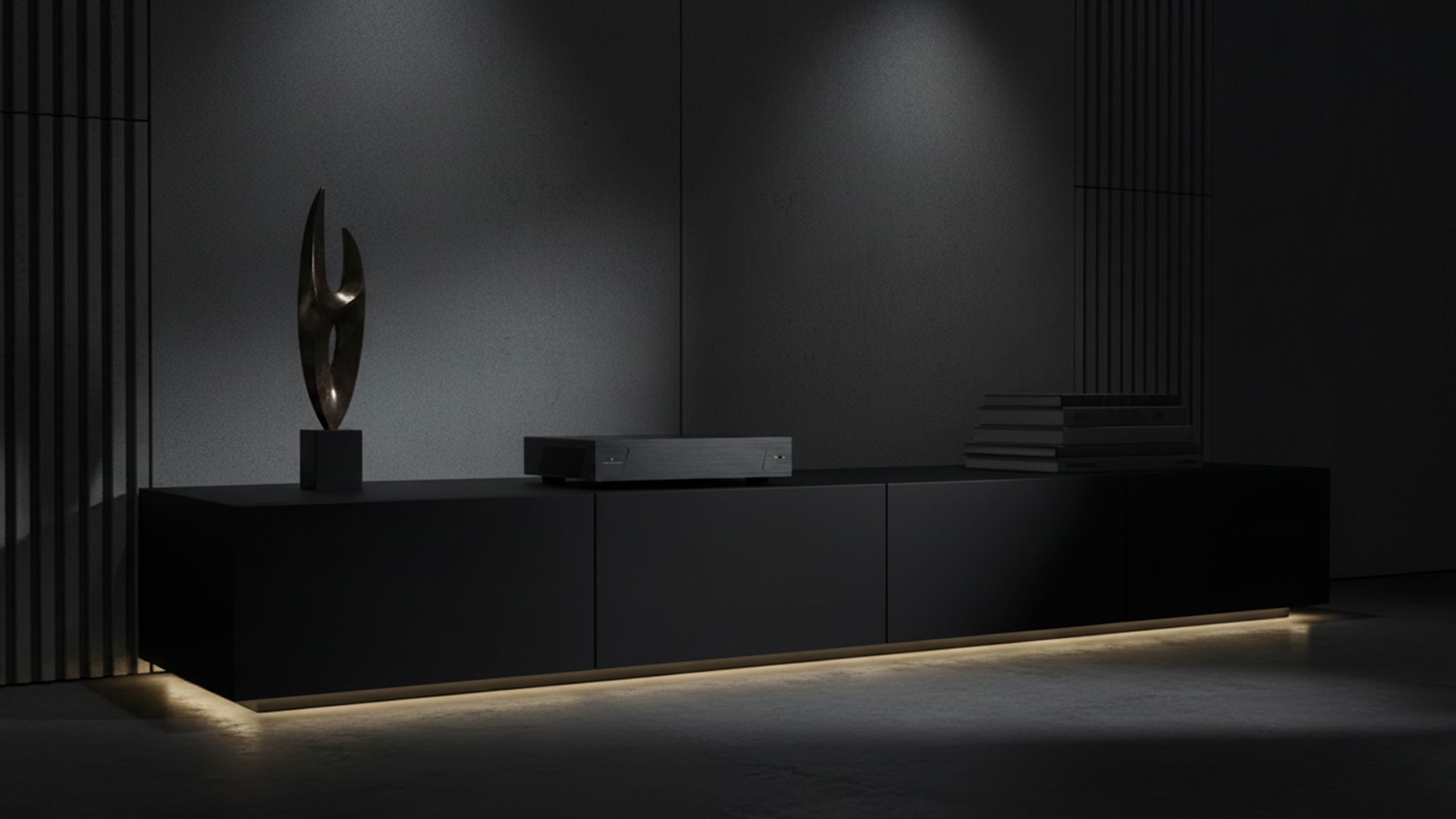 Luxury home cinema media room with StormAudio AV equipment on a custom wall-mounted console
