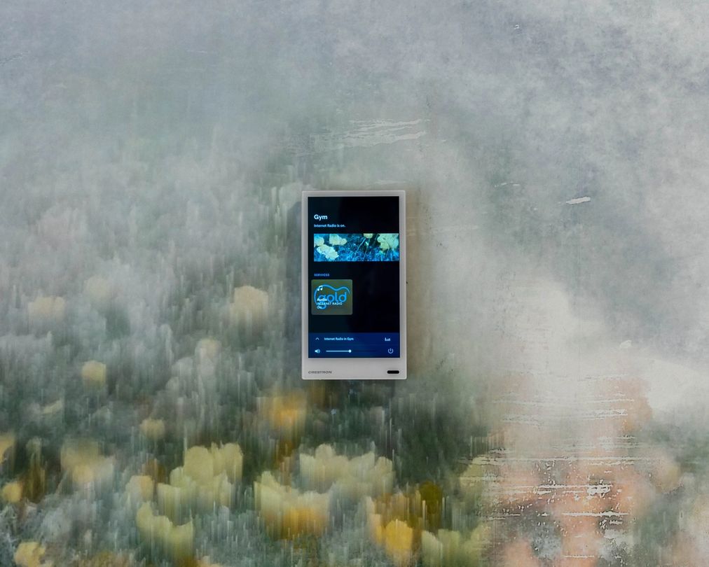 Crestron Touch Screens in Connaught Care Crestron touch screen installed in Connaught Care, showcasing user-friendly home automation controls.