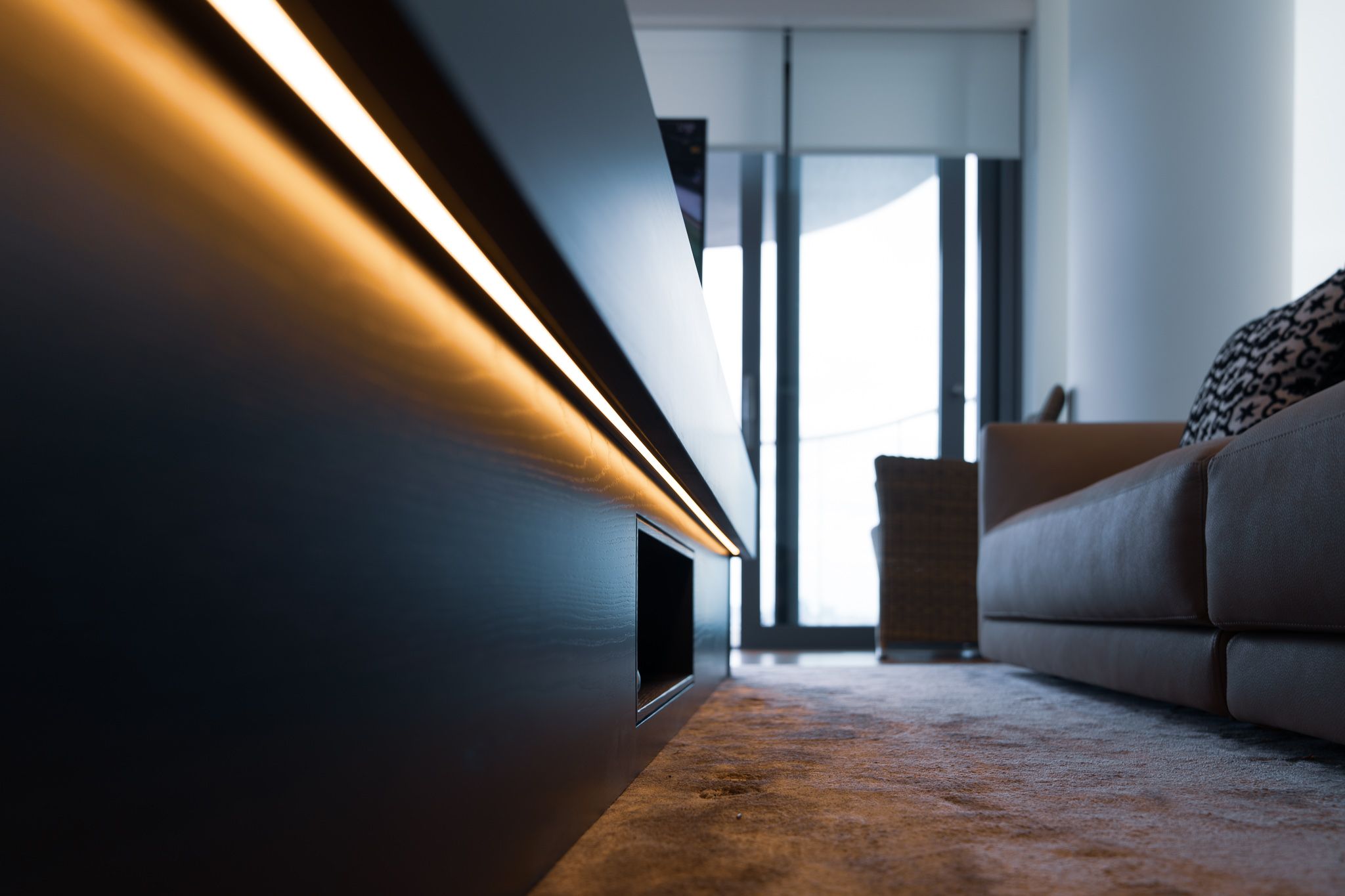 Bespoke AV furniture with with automated TV lift and LED lighting Bespoke AV furniture with with automated TV lift and LED lighting