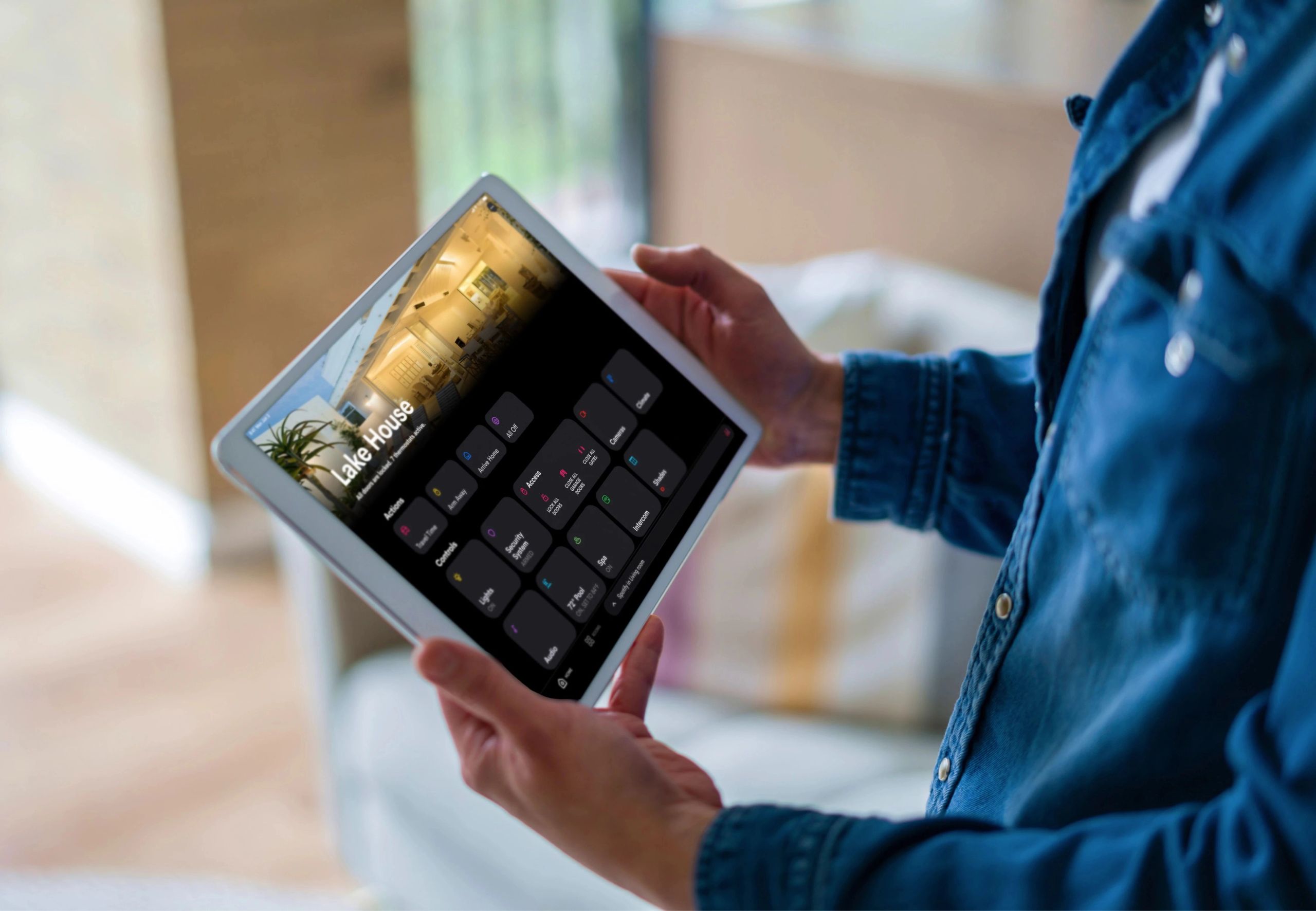 Screenshot of the Crestron Home app interface on a mobile device, displaying various smart home control options for lighting, temperature, security, and more.