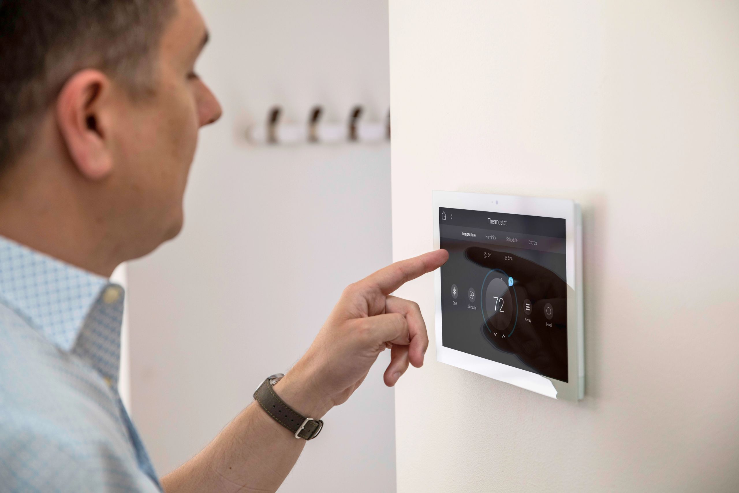 Control4 touch screen Control4 navigation for heating installed by Modal AV