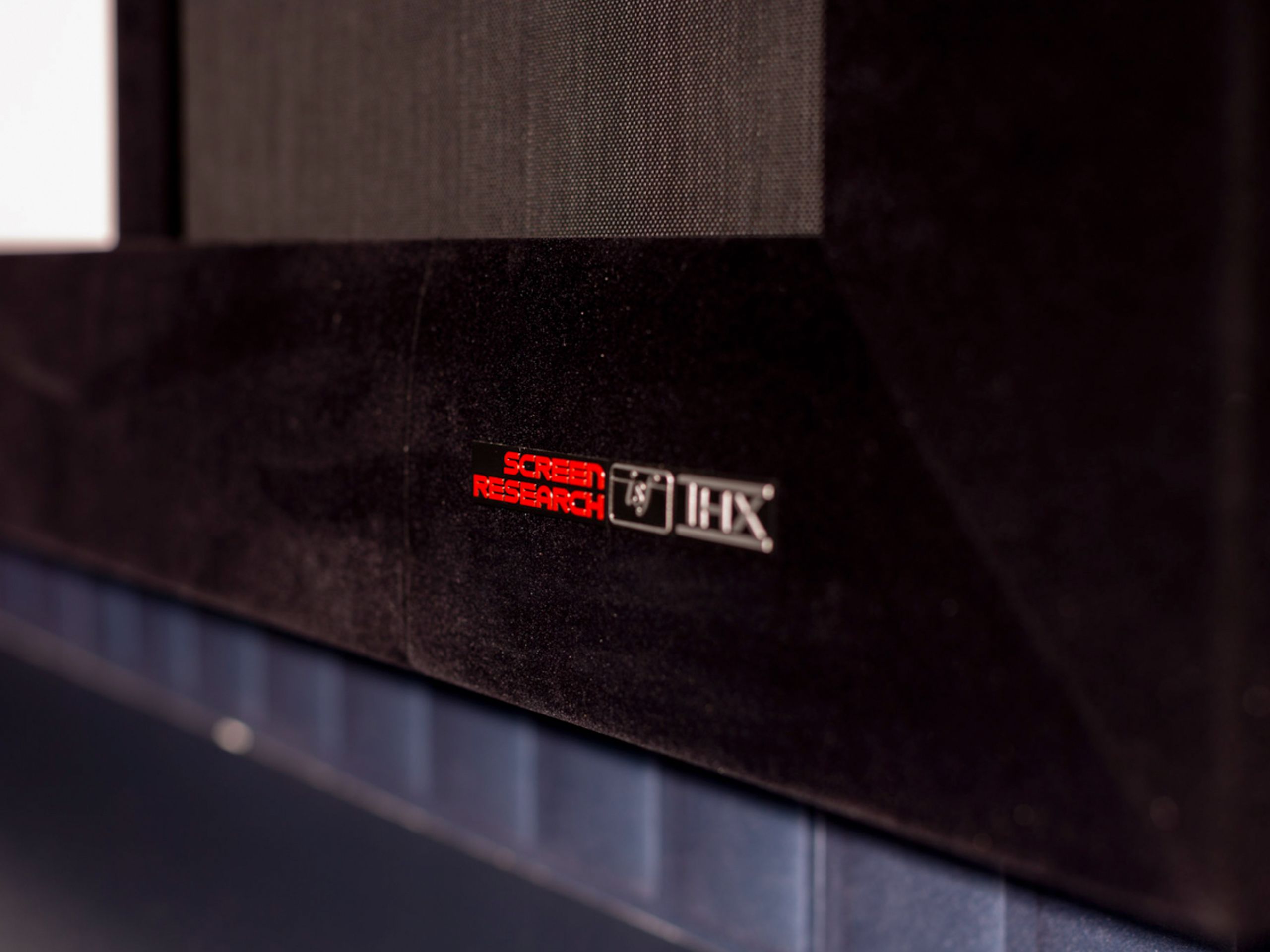 Fixed-frame 2.40:1 cinema-scope projection screen with motorised masking