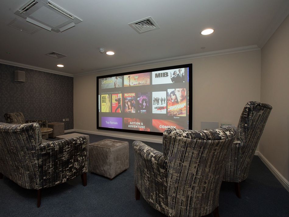 Dedicated cinema room with 4K visuals and 7.1 surround sound Dedicated cinema room with 4K visuals and 7.1 surround sound