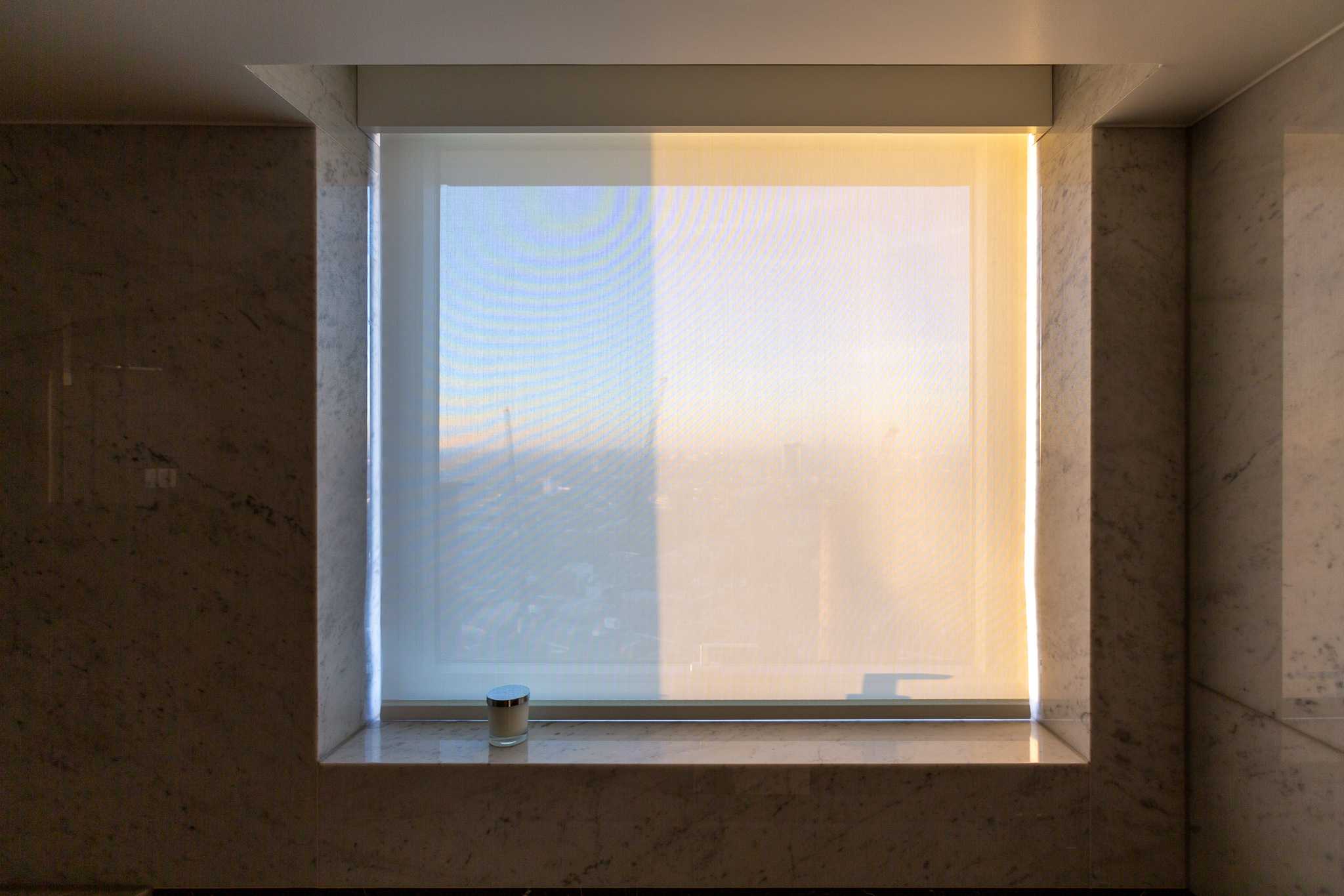 Lutron wireless blind with a discrete pelmet