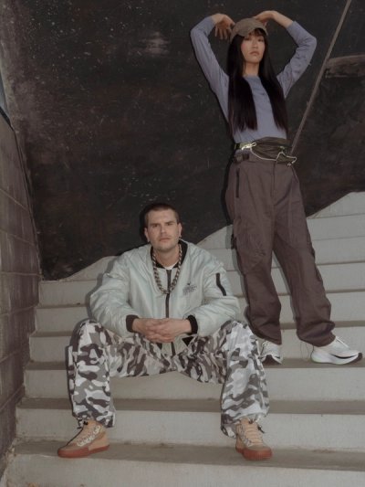model couple posing on stairs