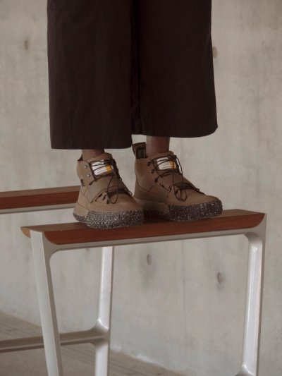 close up on brown shoes