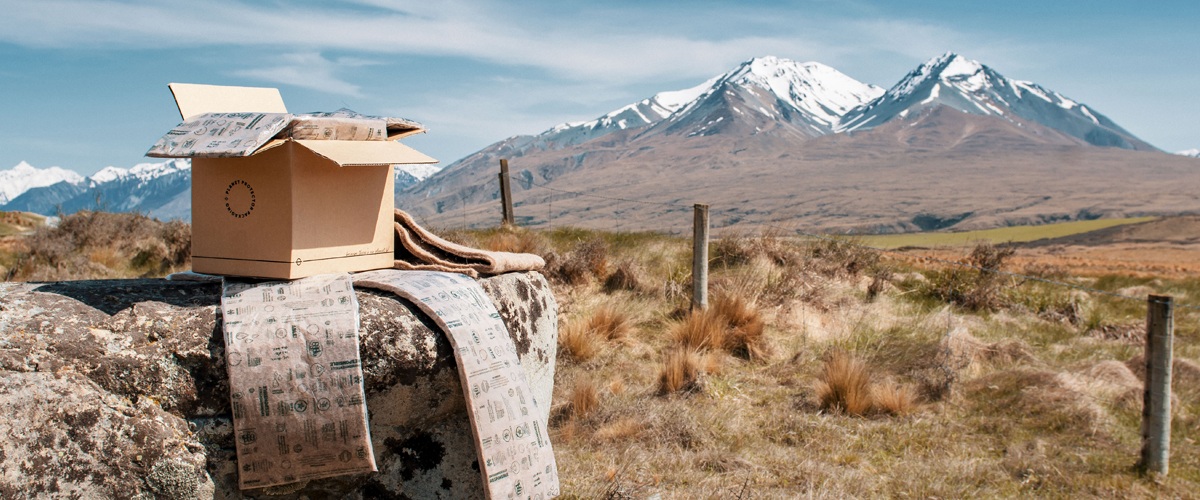Carton box against mountain backdrop