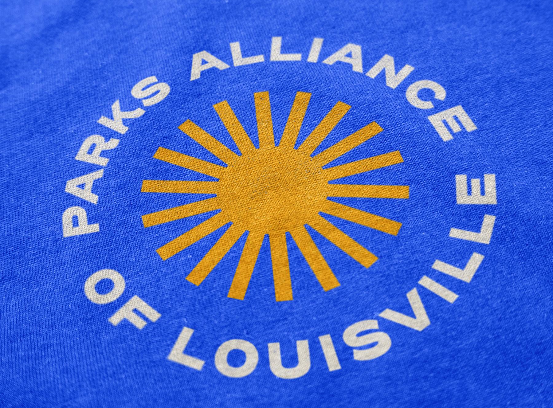 Parks Alliance of Louisville logo printed on a blue shirt.