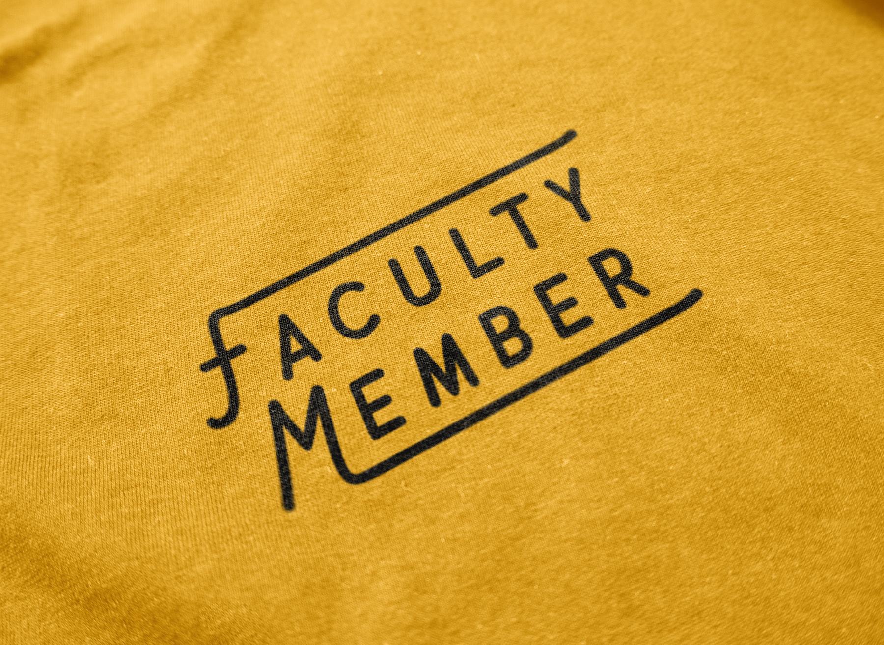 "Faculty members" screen printed in black on a yellow shirt.