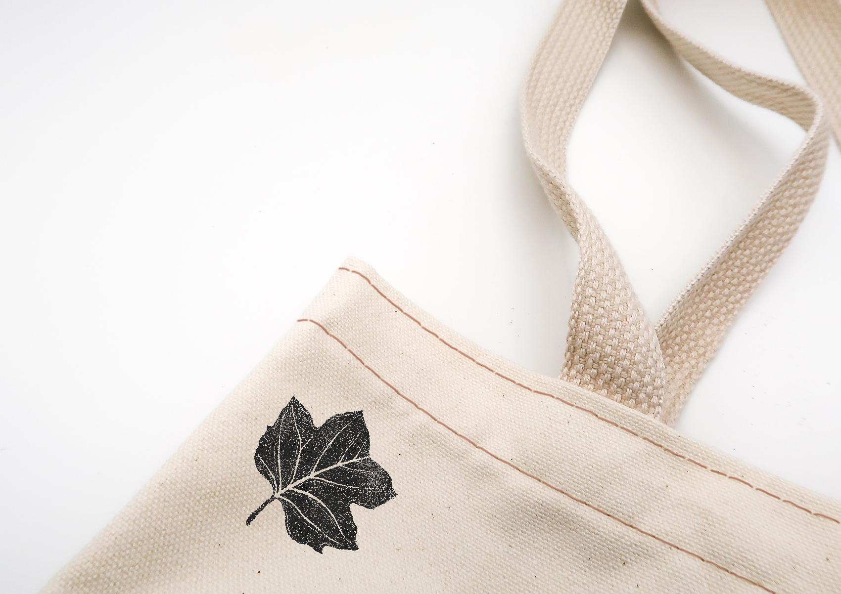 Custom musician canvas tote for Ben Sollee with black poplar leaf design.