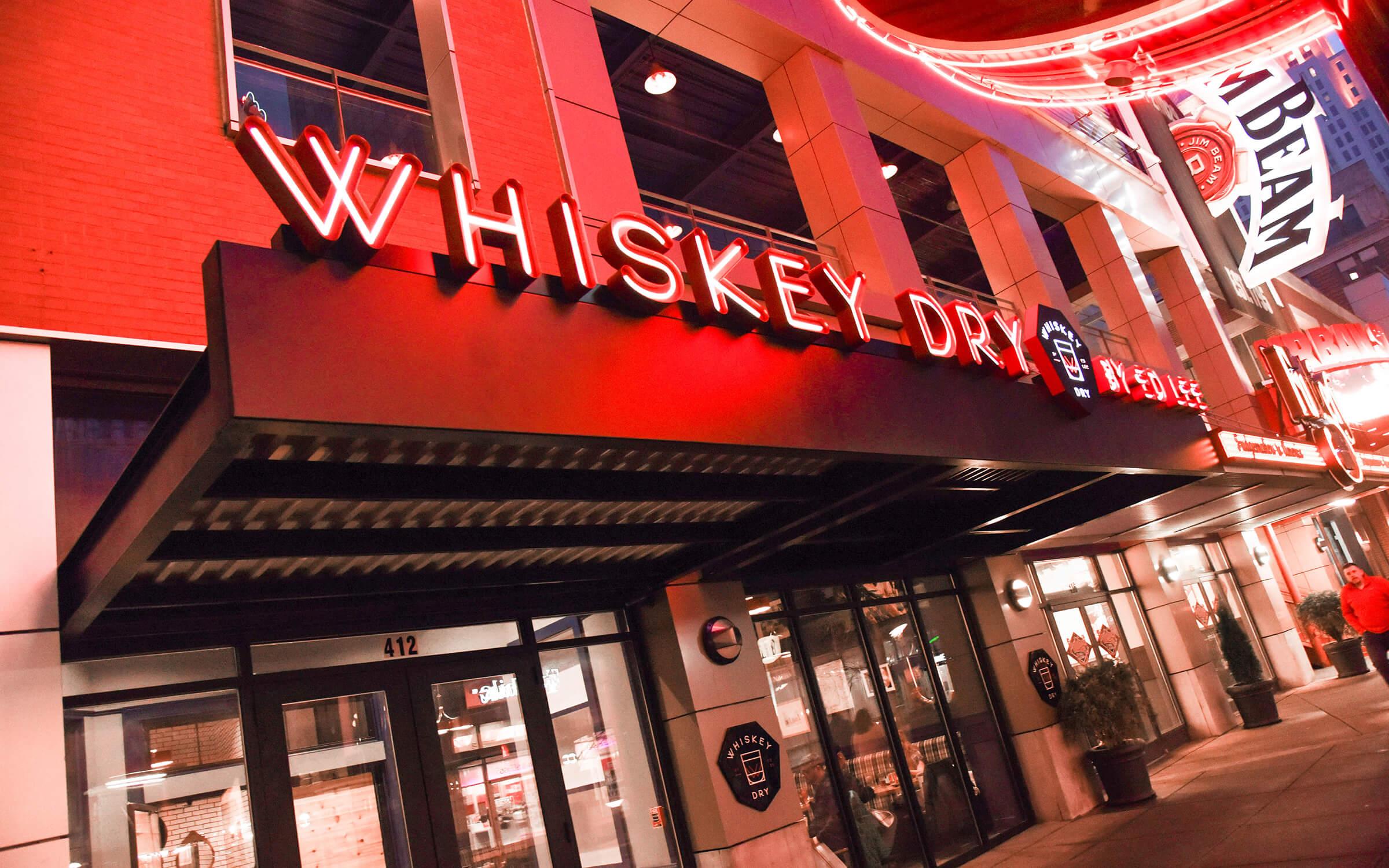 Whiskey Dry neon channel lettering exterior sign.