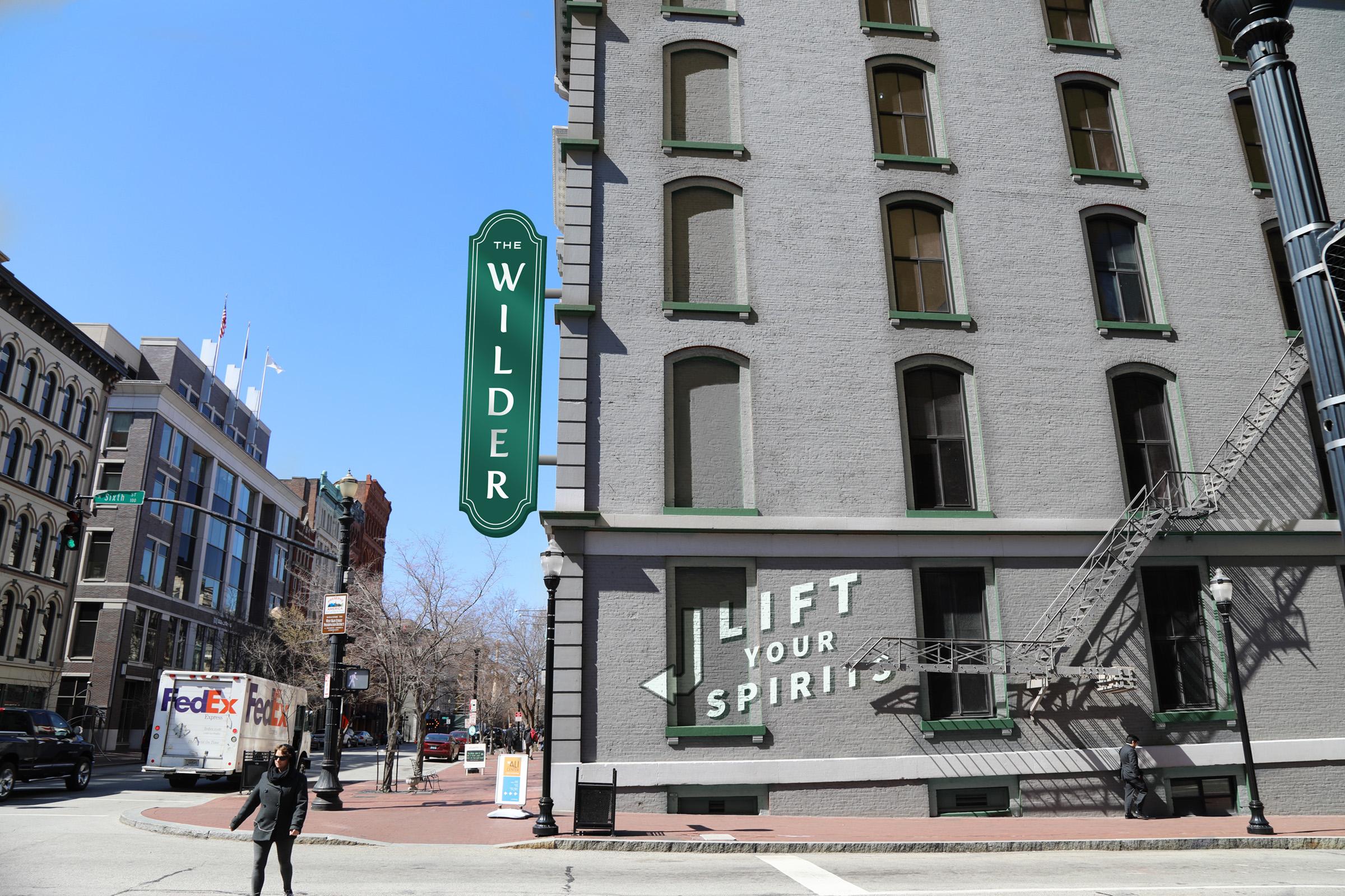 Exterior sign and mural for The Wilder Hotel.