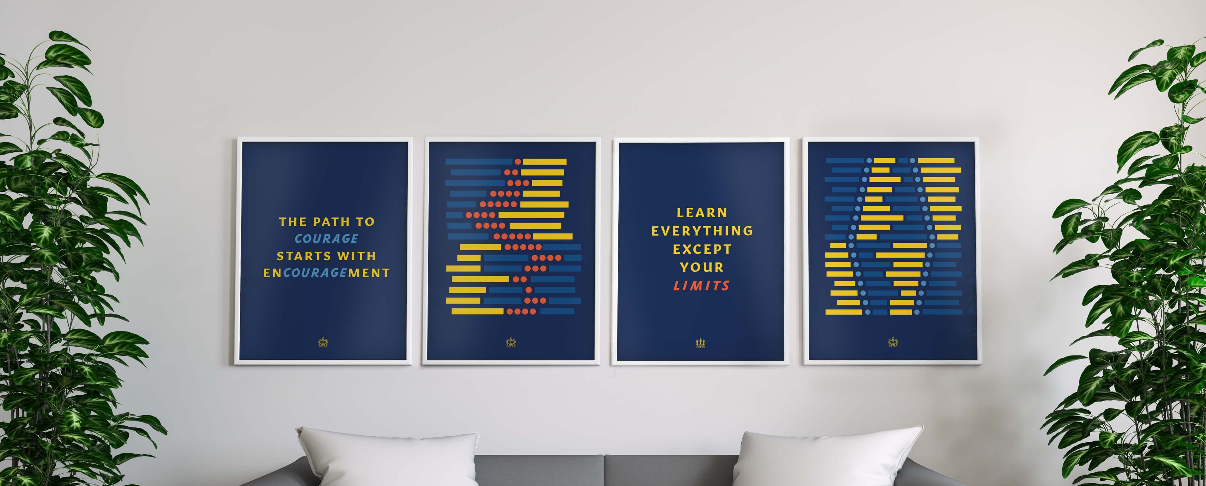 Four inspirational poster designs on a wall.