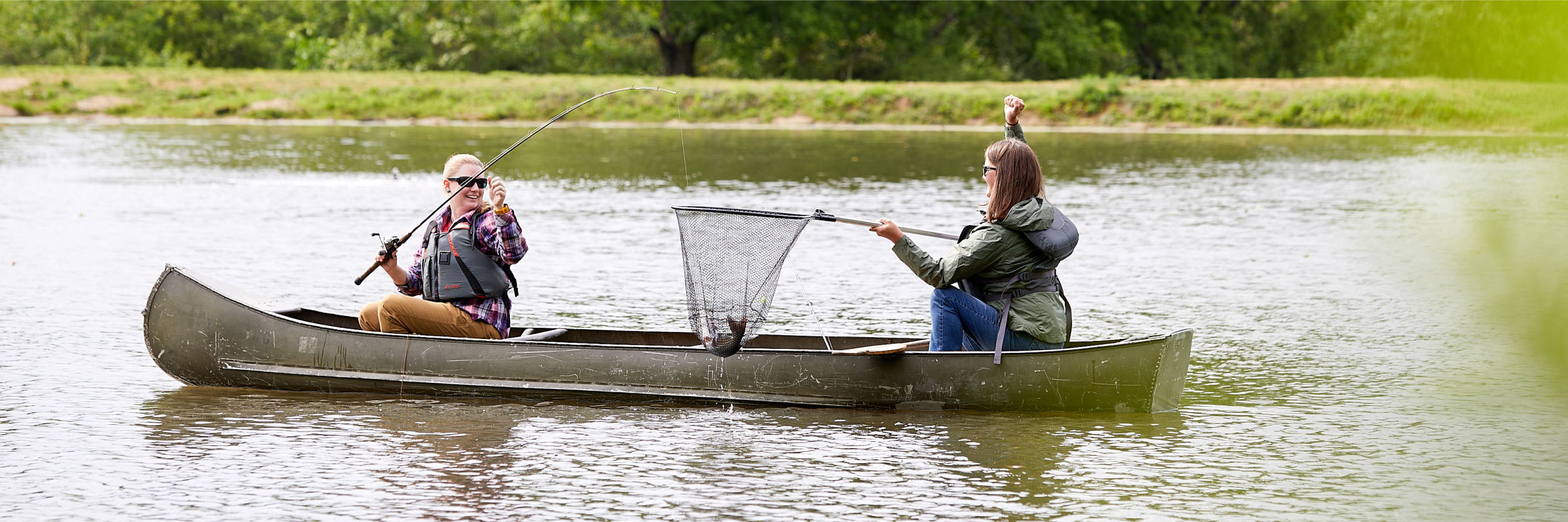 Banner image of women fishing in Kentucky