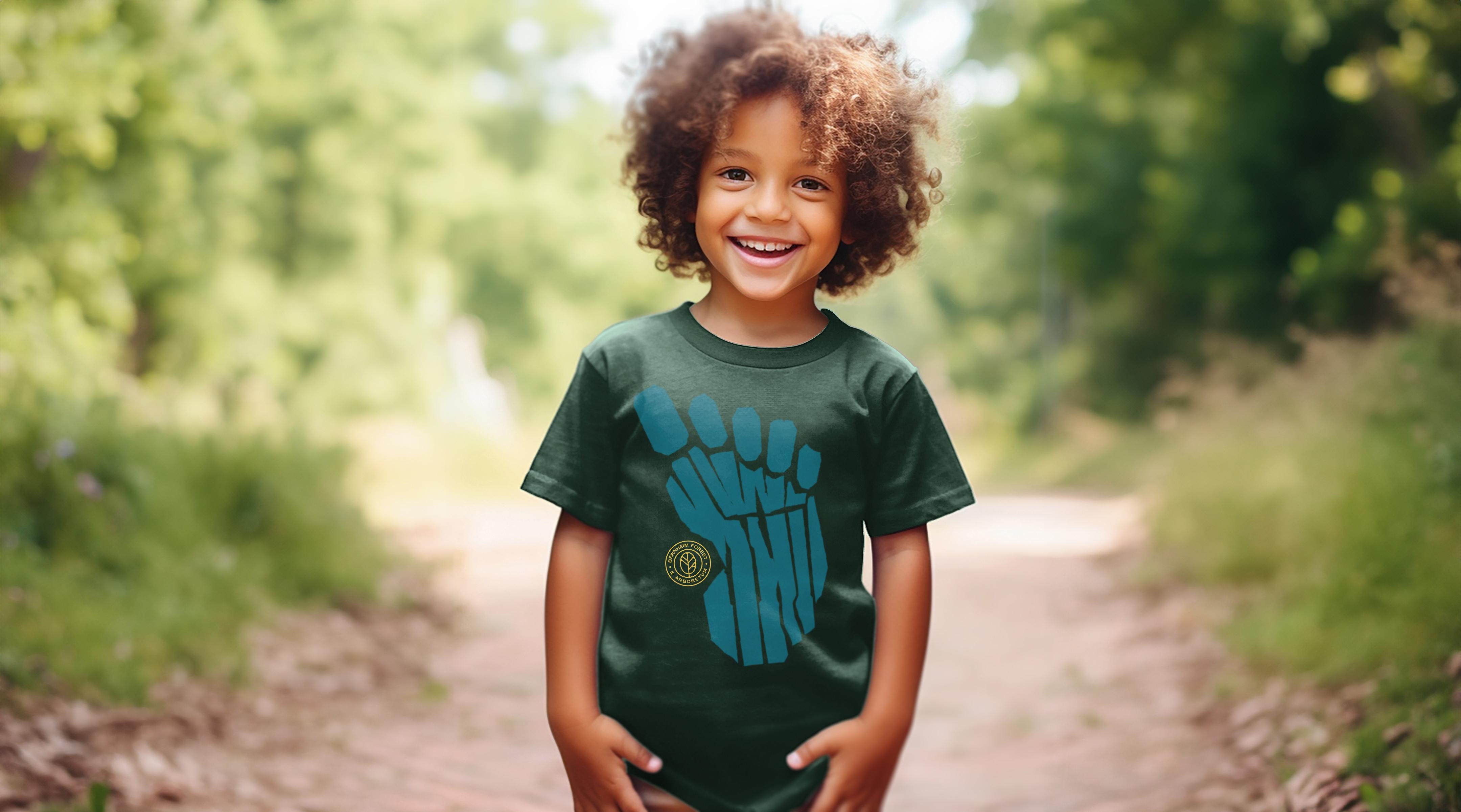 Child wearing a Bernheim Forest tshirt