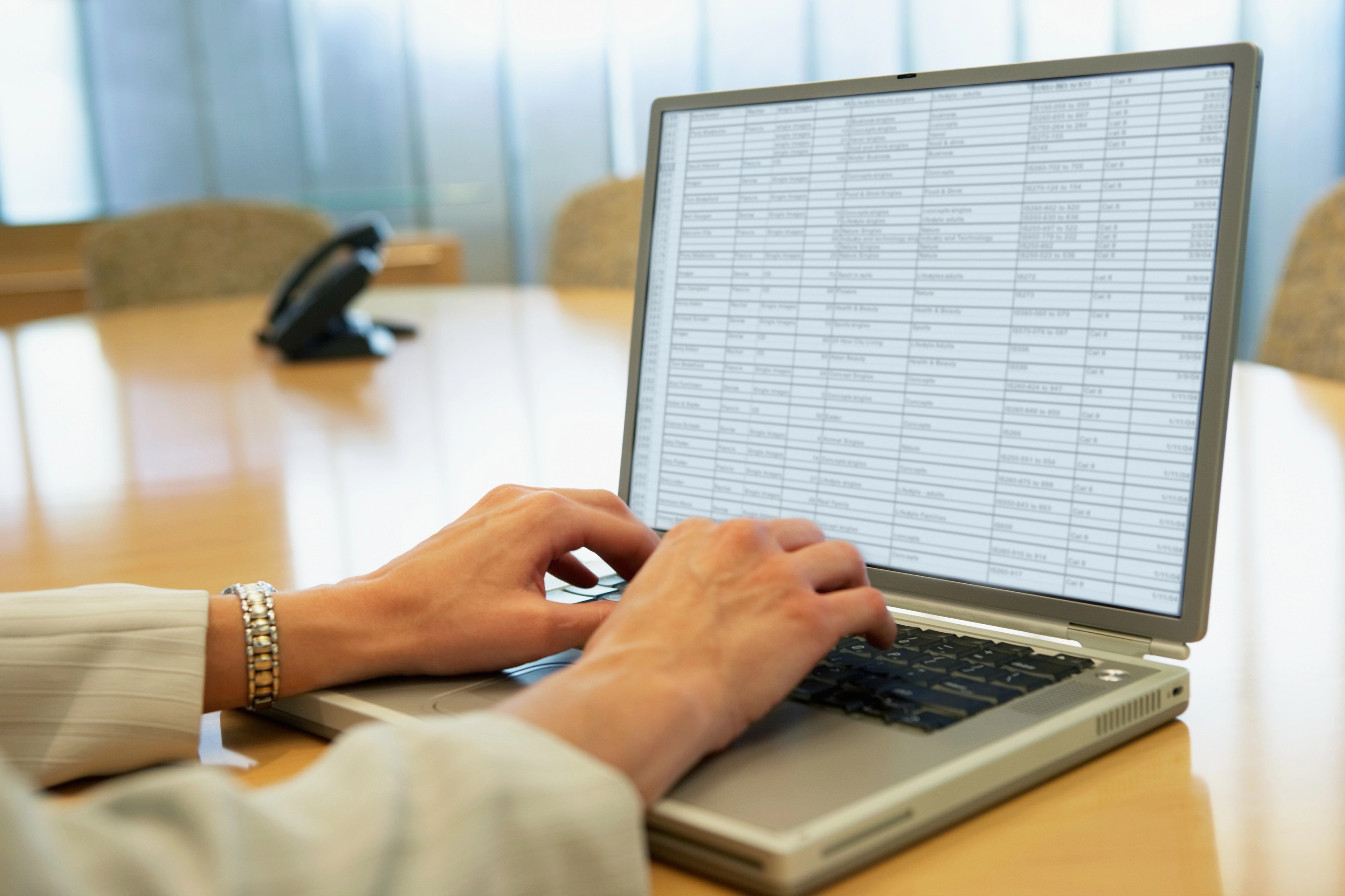 Businesswoman using laptop