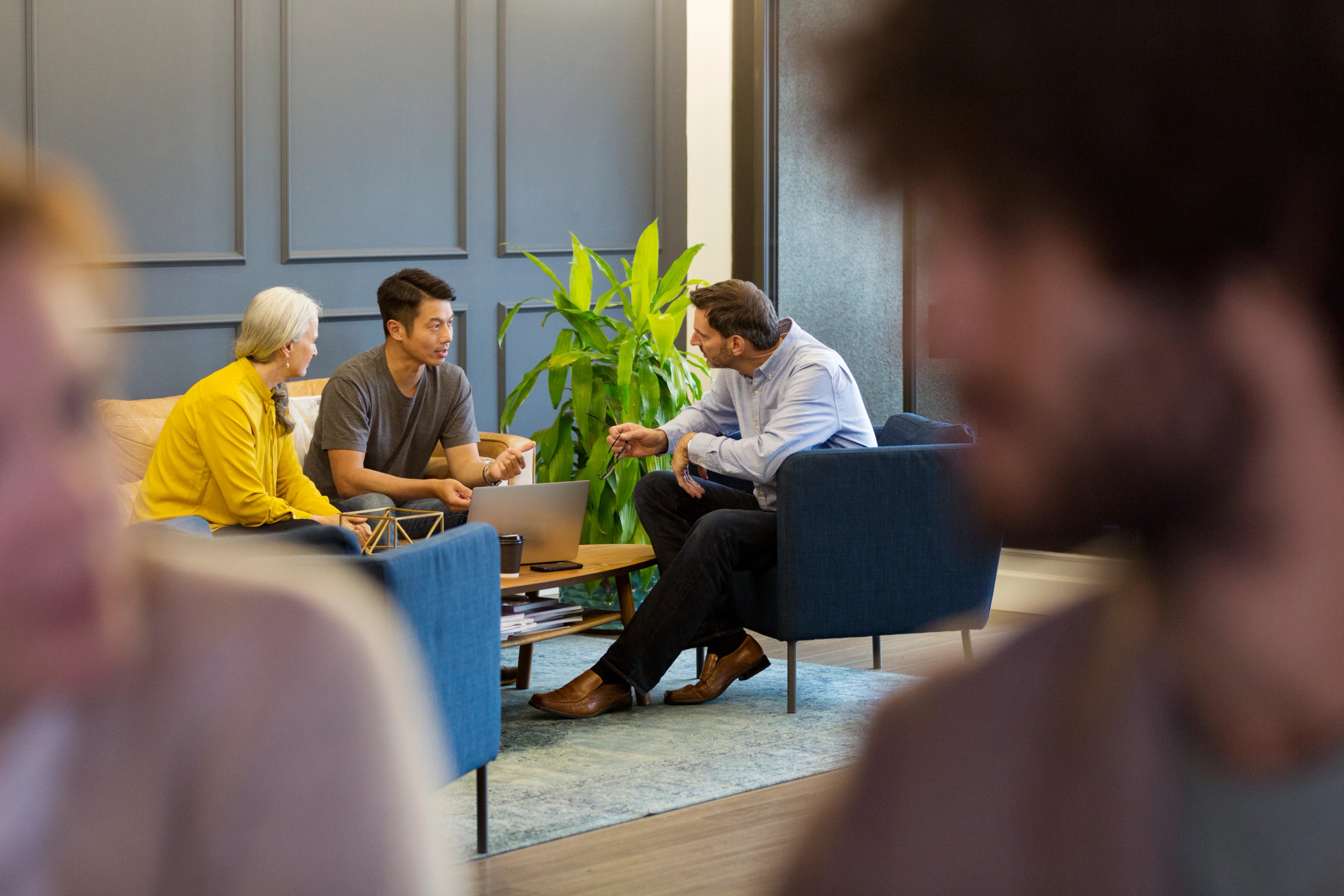 A group of professionals discussing Canada AI regulations and AIDA