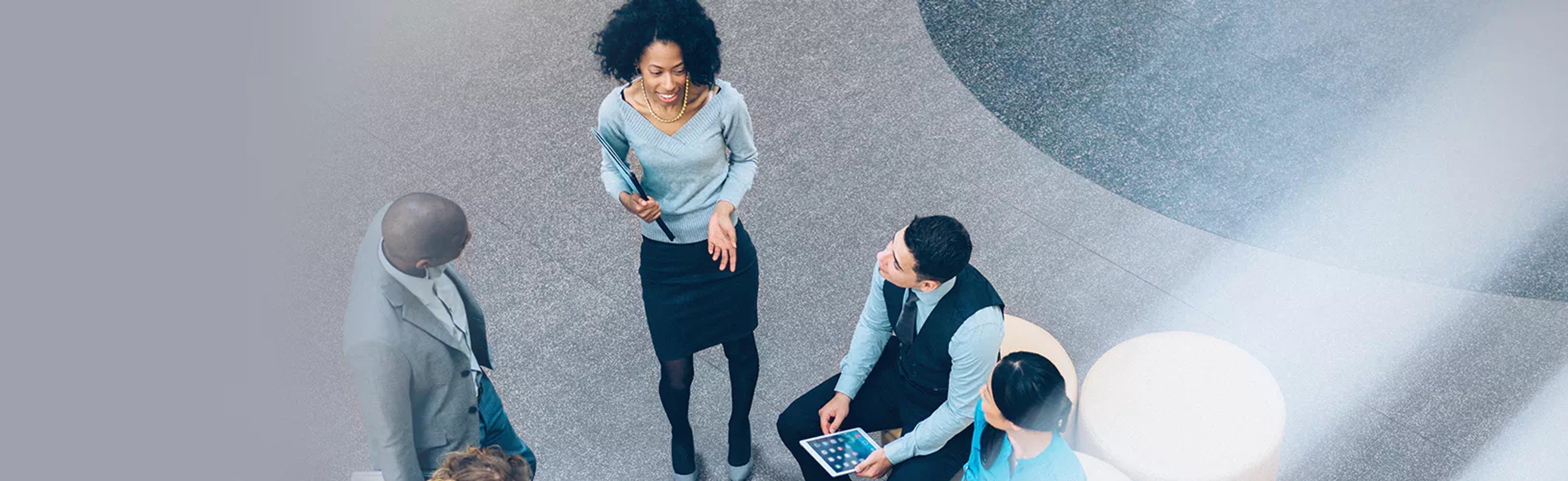 Professionals discussing why third-party risk management is important and tips for an effective TPRM strategy.