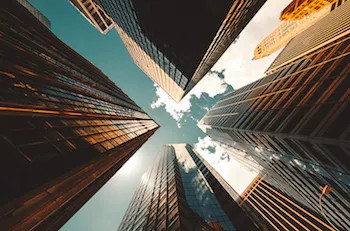 Depiction of buildings which contain businesses that can be considered legal entities.