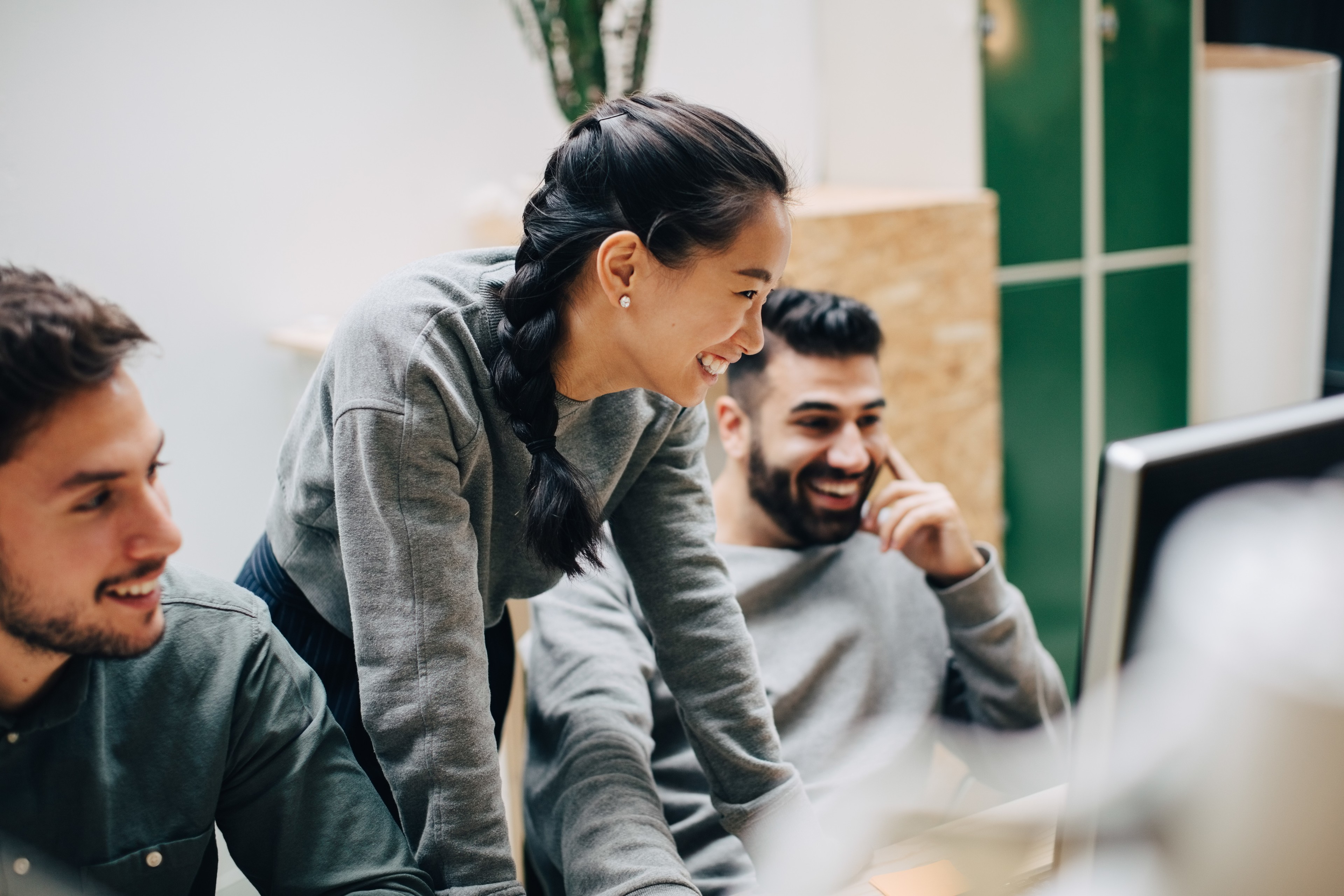 Professionals making use of a robust SaaS solution.