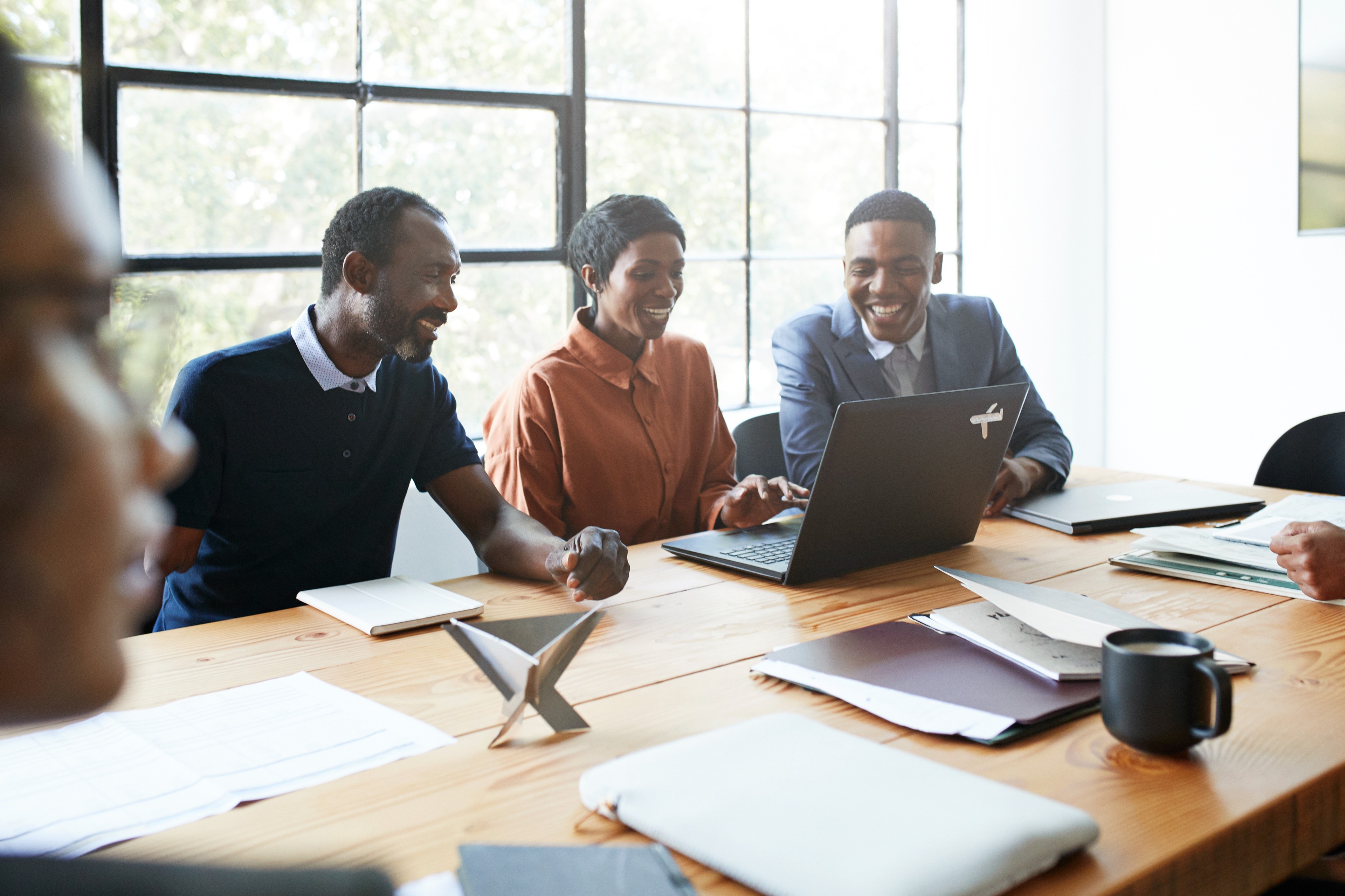 Audit professionals discussing tech