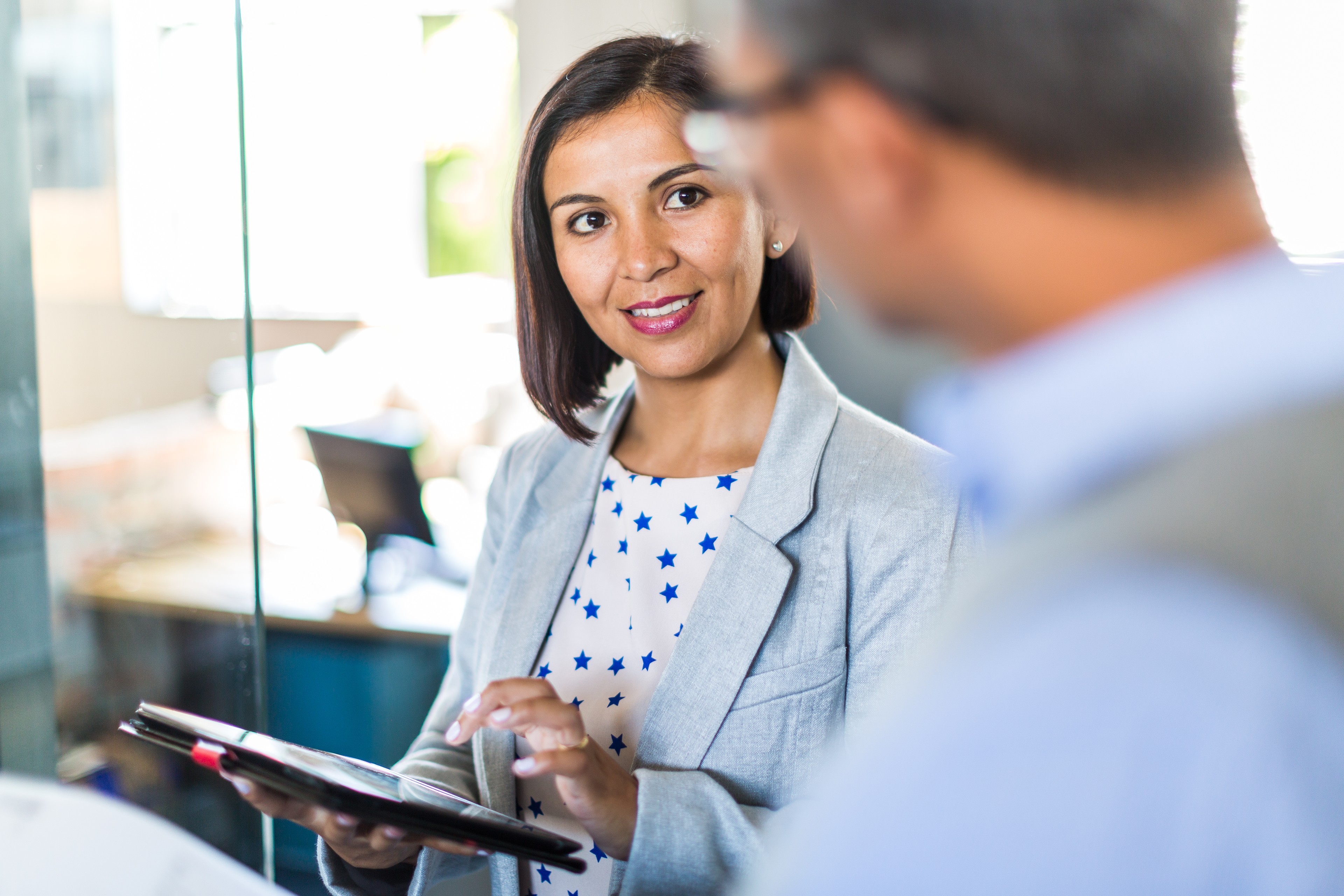 Two managers talking in a small business
