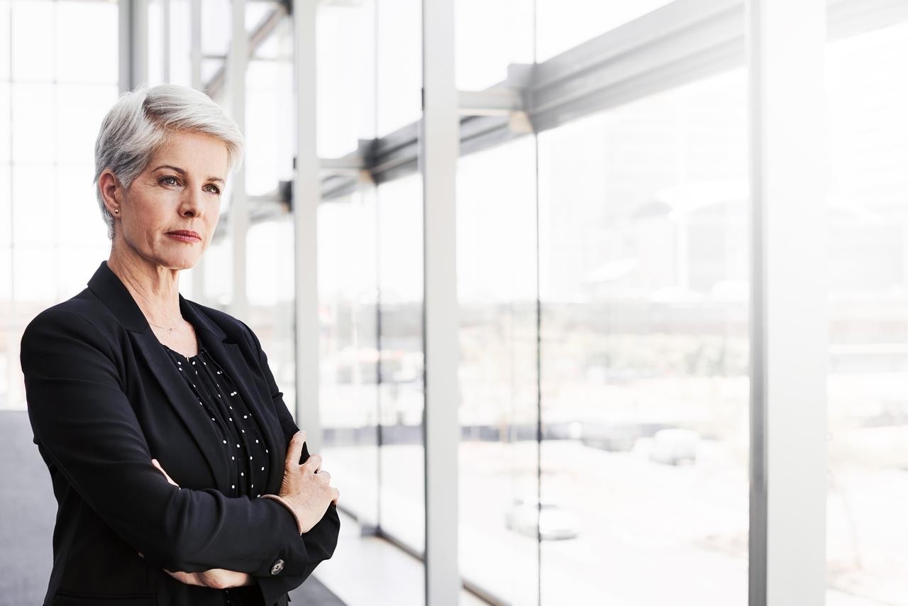Woman executive looking out a window