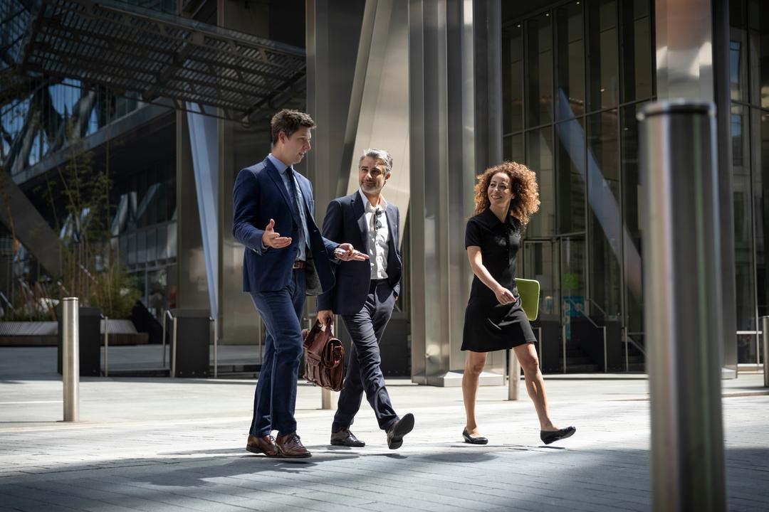 Colleagues discussing the importance of internal controls