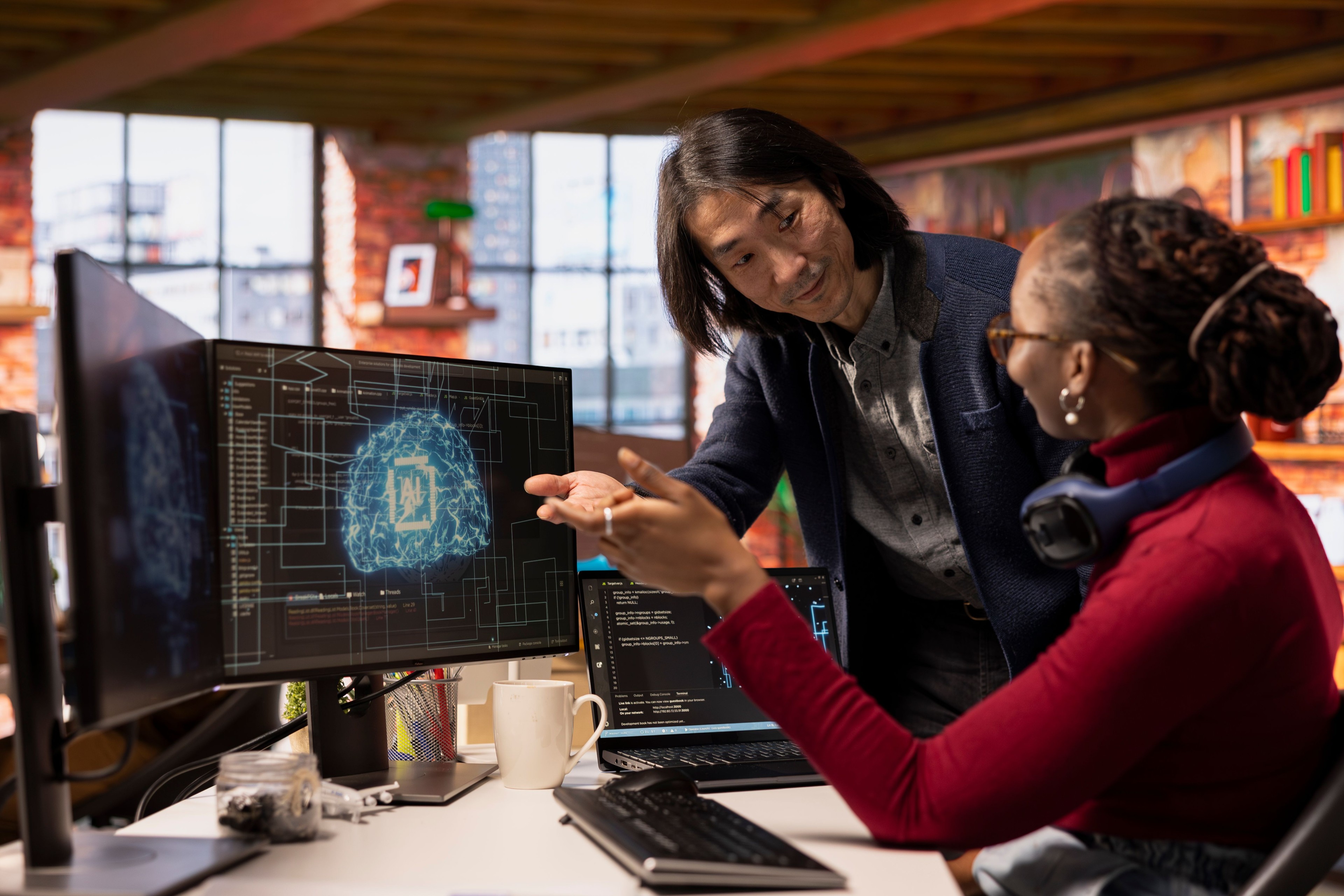 Two Business People looking at an AI image on screen