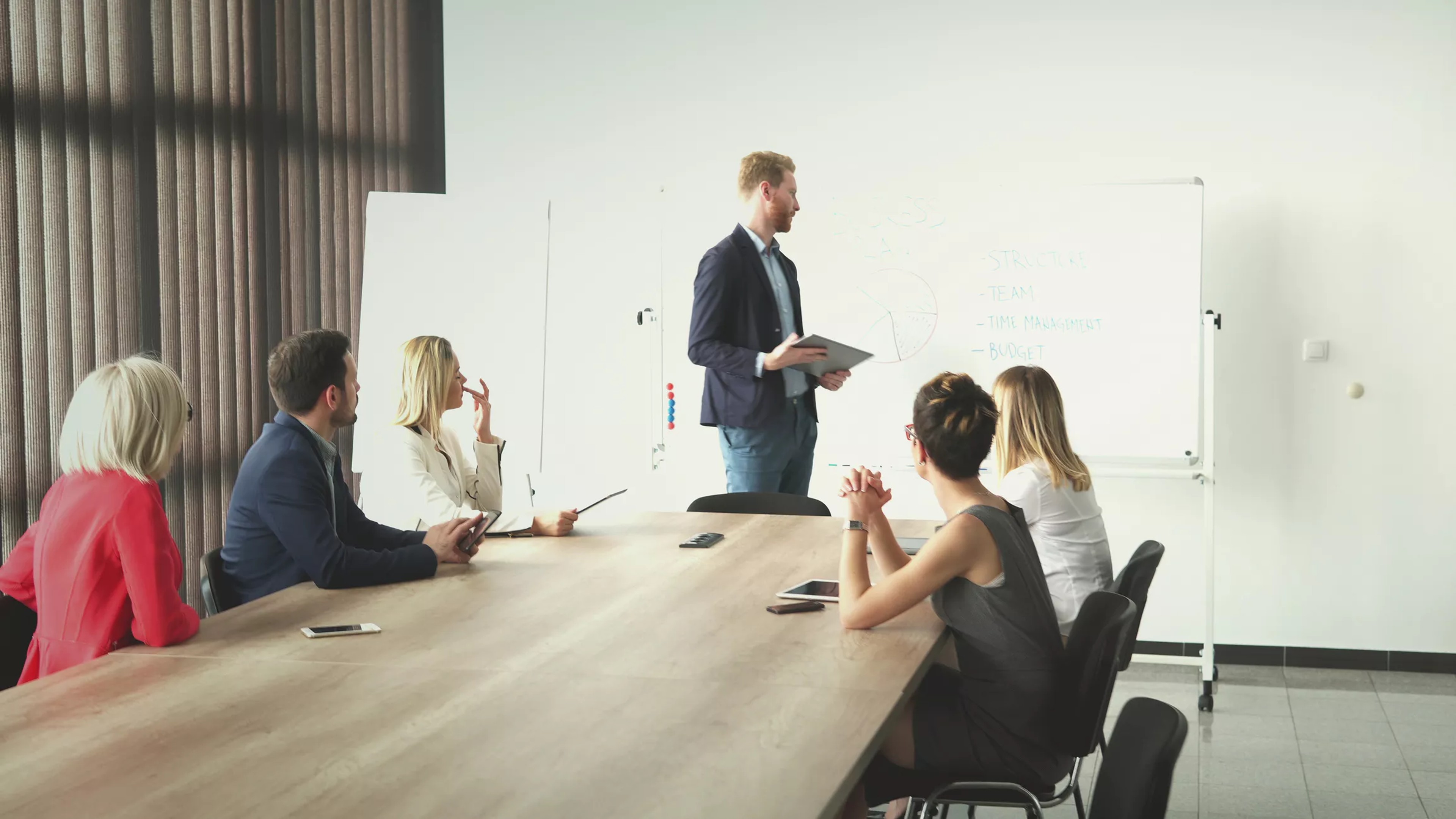 Chairman of board running a meeting