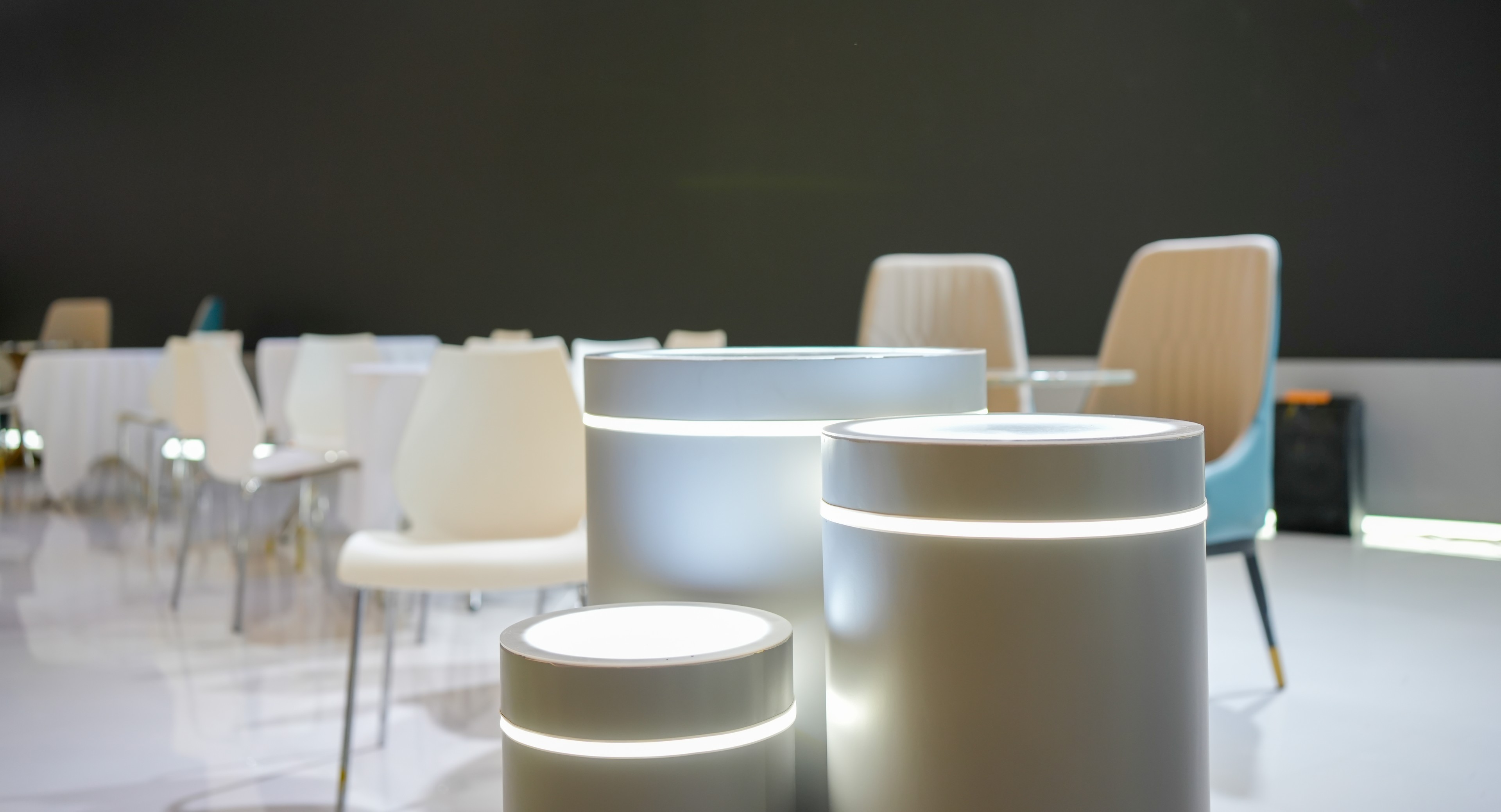 Empty Board Room Interior With Table, Office Chairs And Neon Lighting