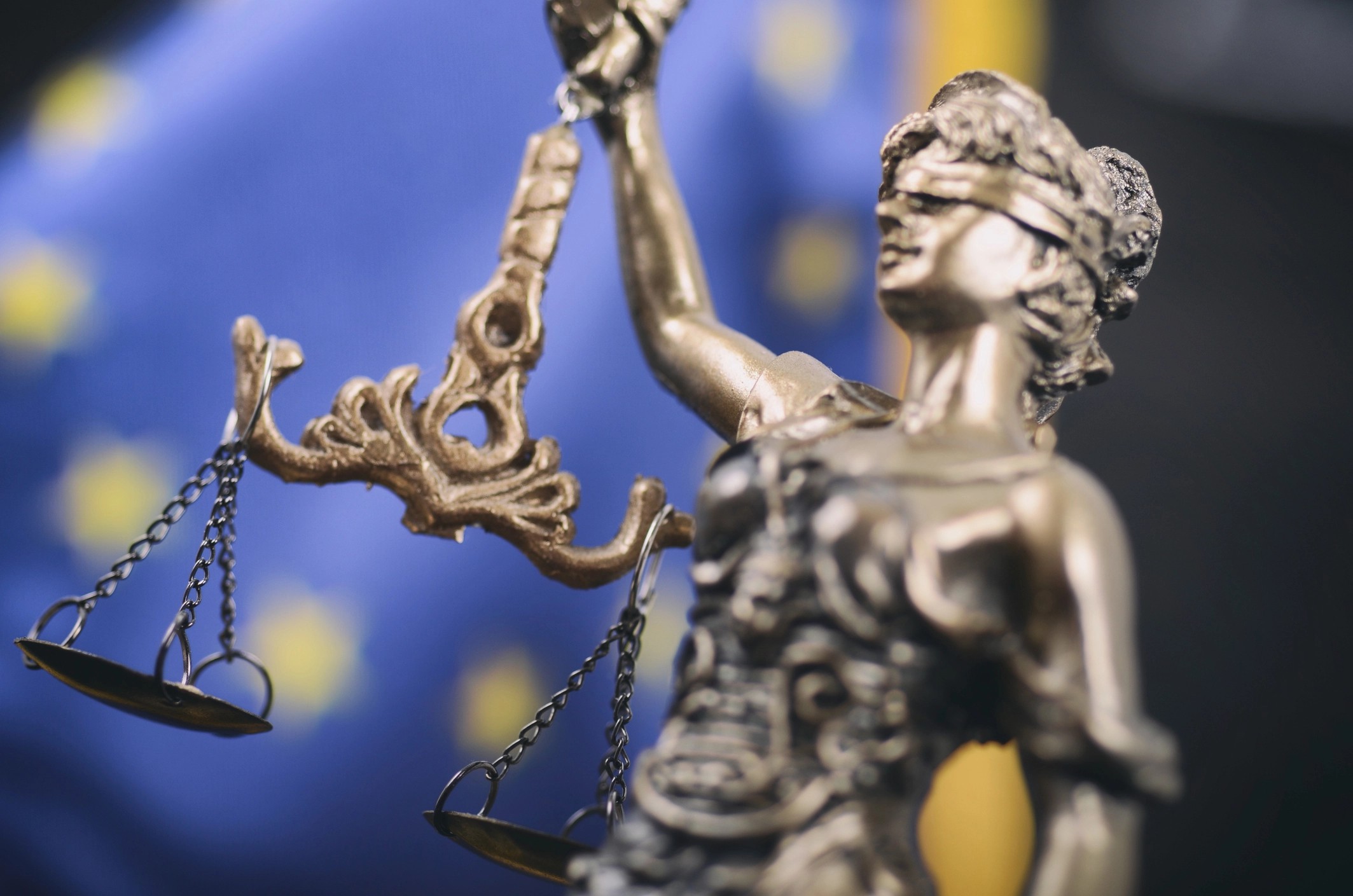 Image of Justice scales and EU flag