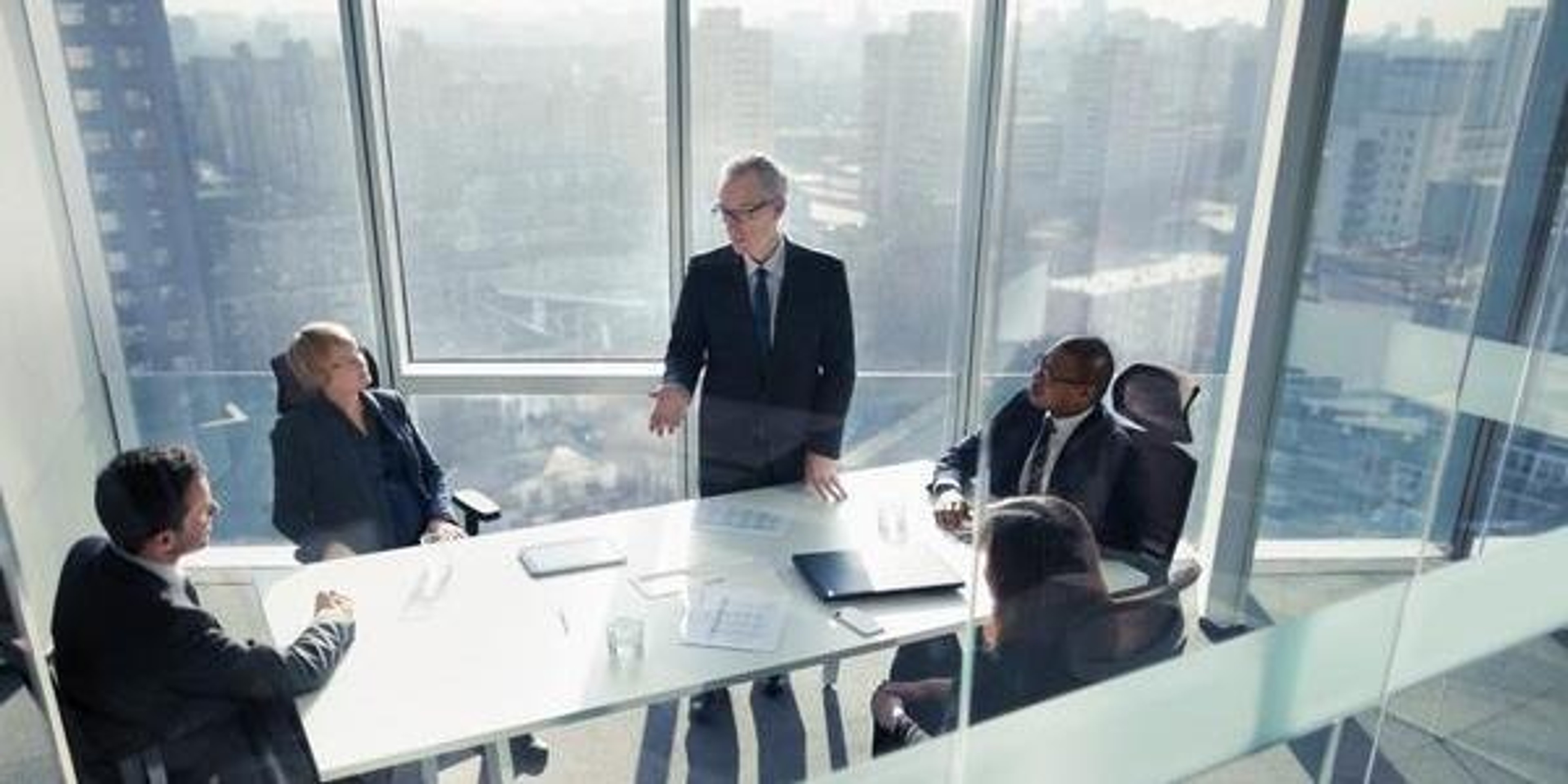 Members of the executive committee using Diligent during their CEO succession planning process