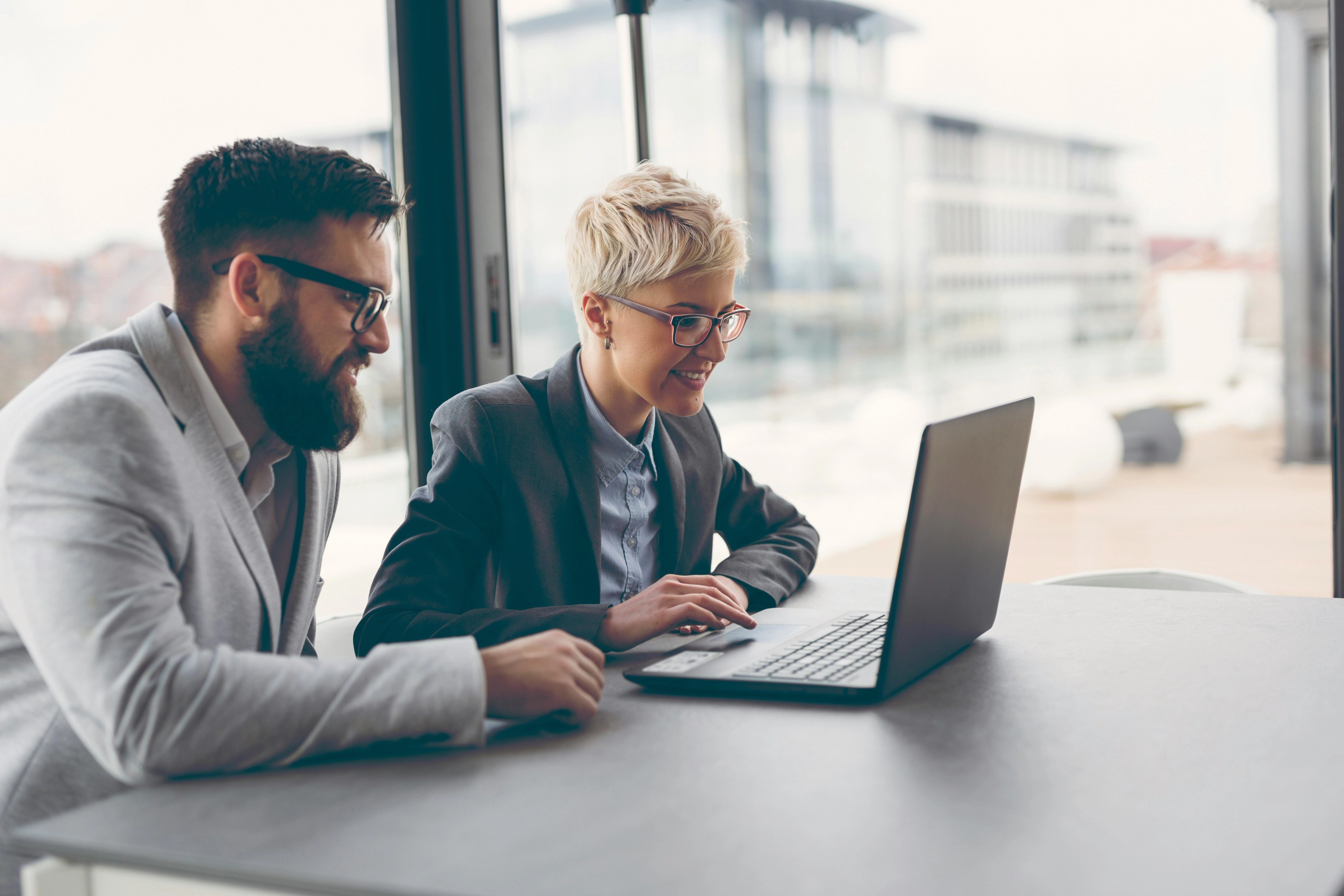 Team mates performing continuous risk monitoring