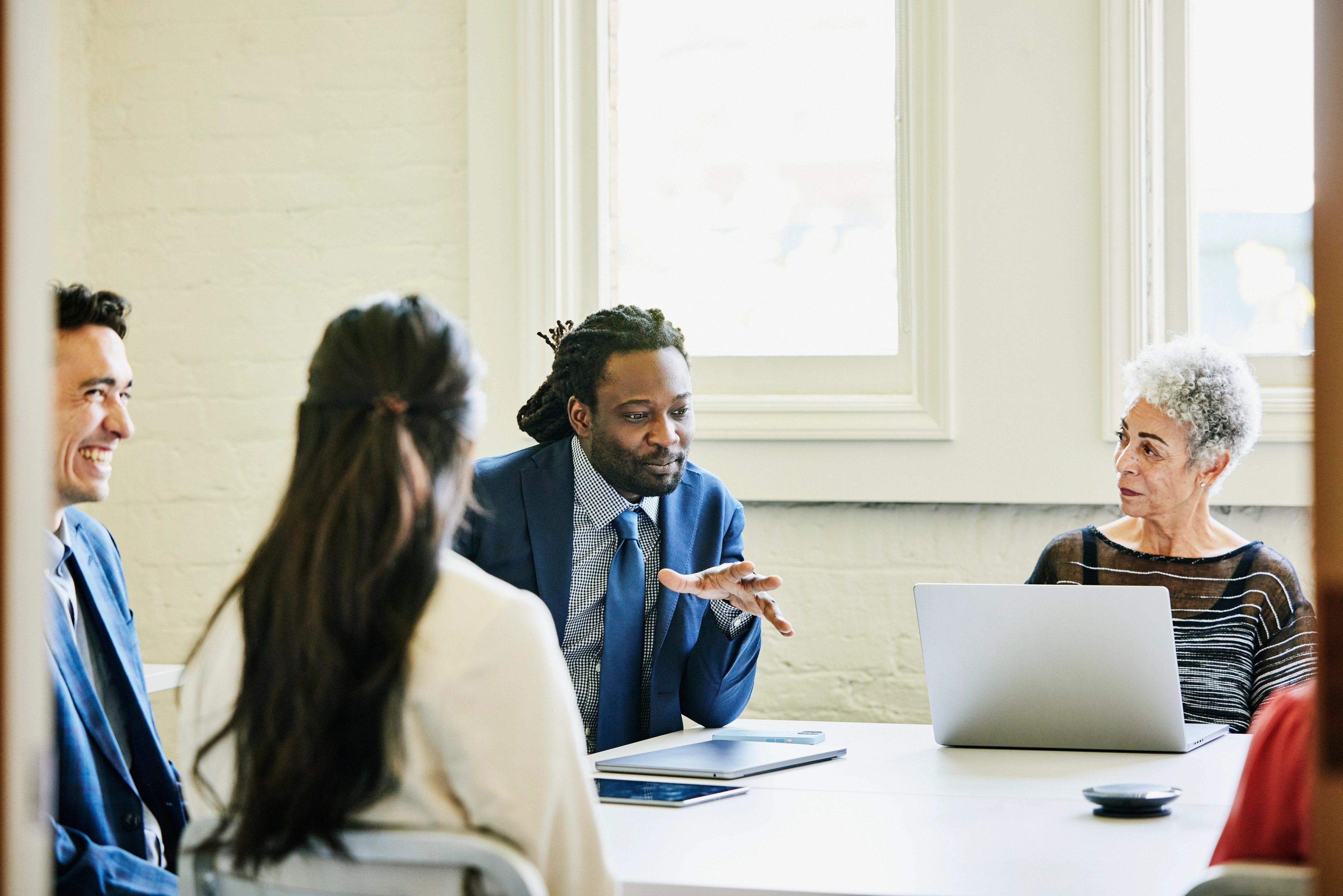 businessman leading team meeting in conference room