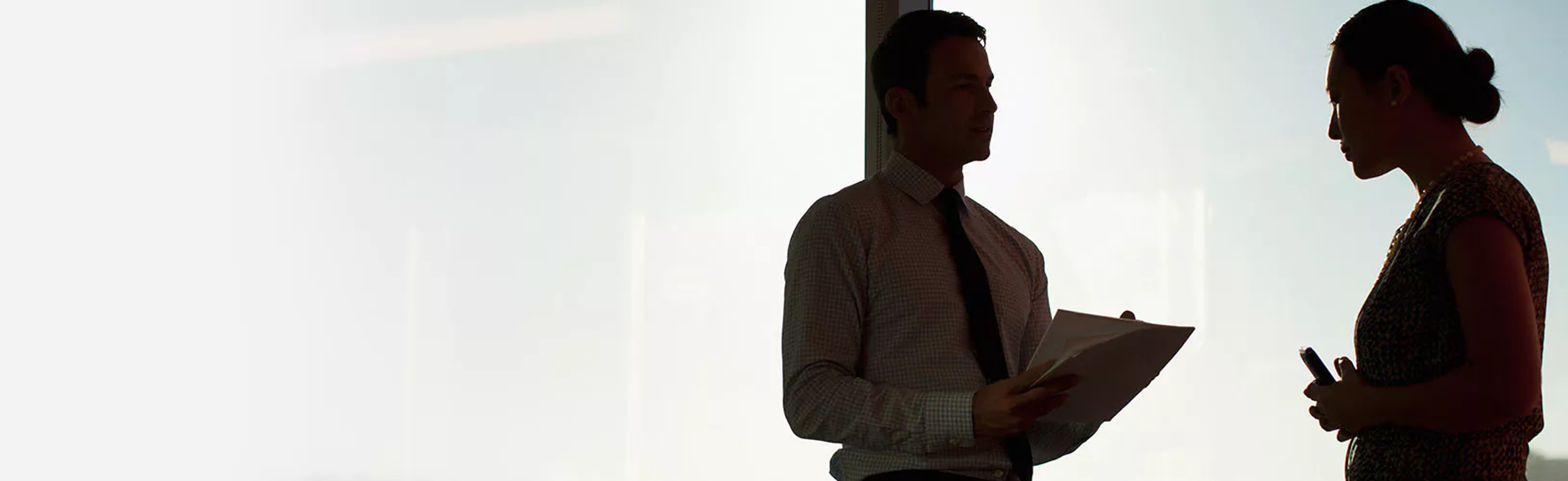 Colleagues discussing trends in shareholder activism