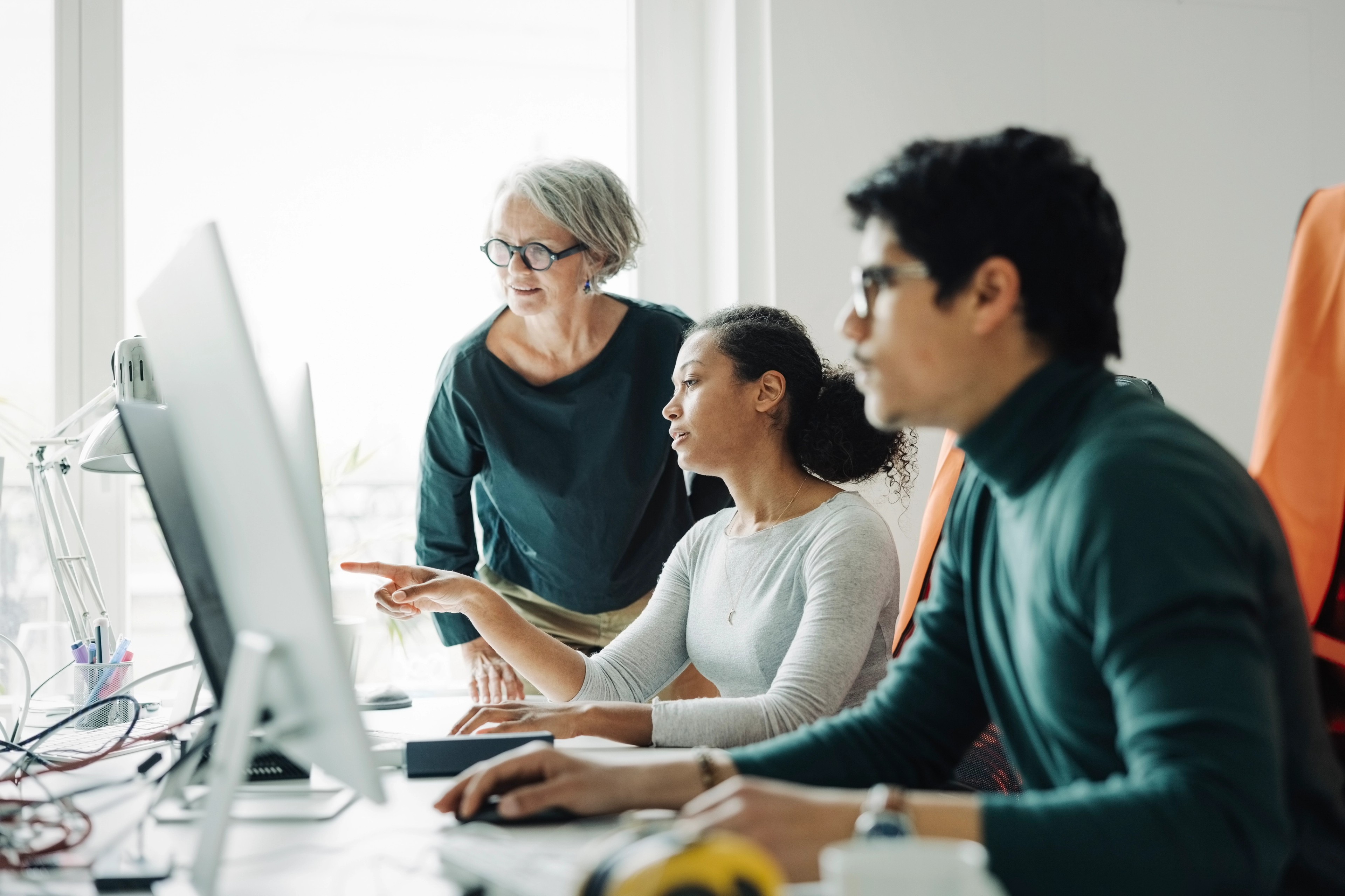 Business people working together in an engineering office