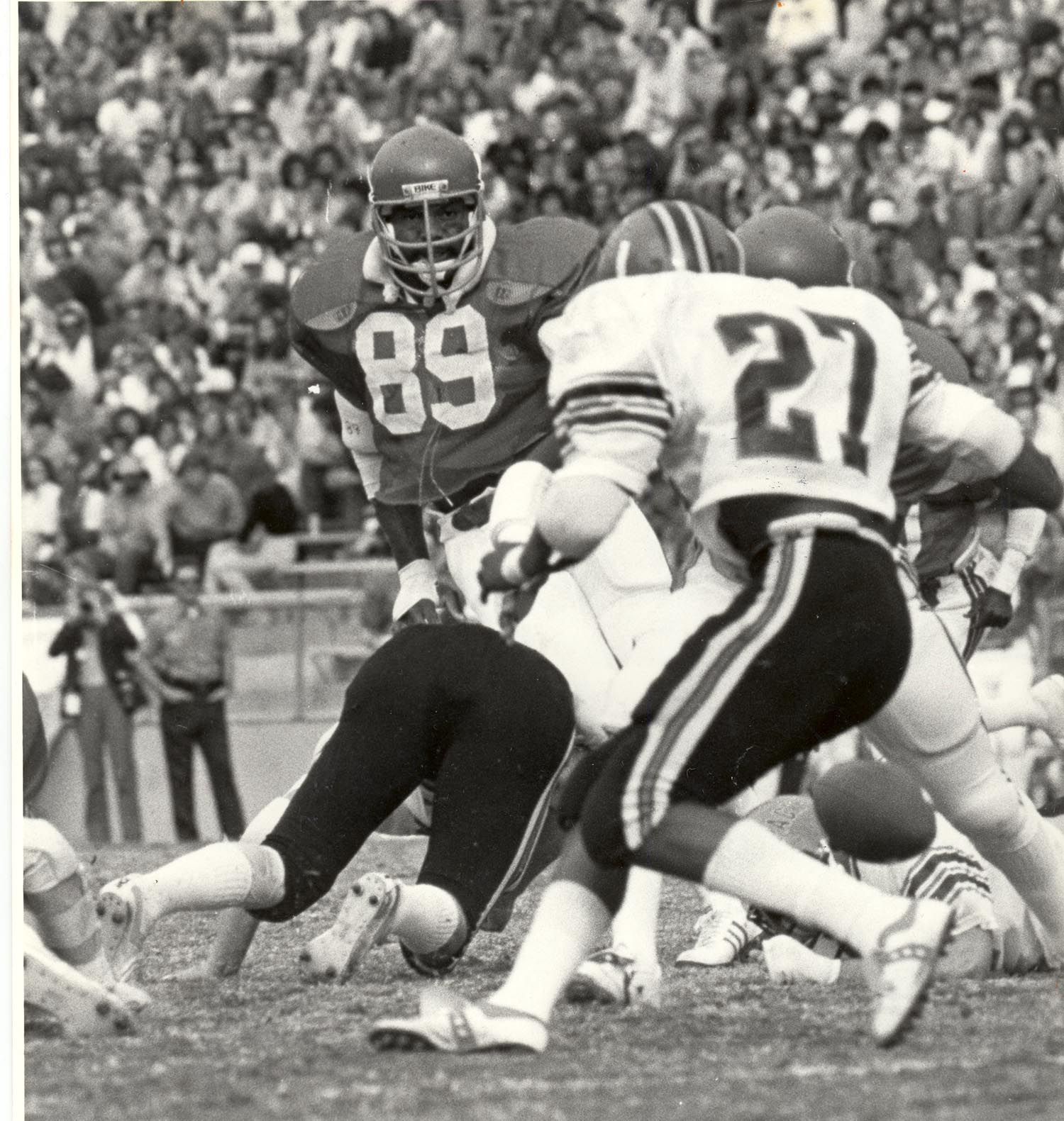 Ricky Hunley, No. 89, closing on the play during his Arizona playing days