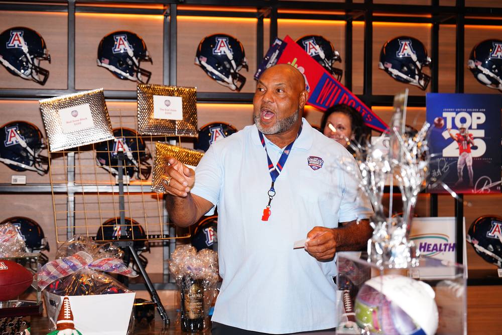 Ricky Hunley speaking at a Hunley Huddle event