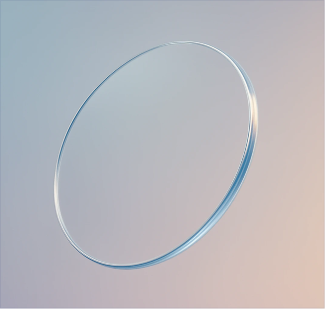 Translucent glass oval ring on a gradient background with subtle blue and pink tones