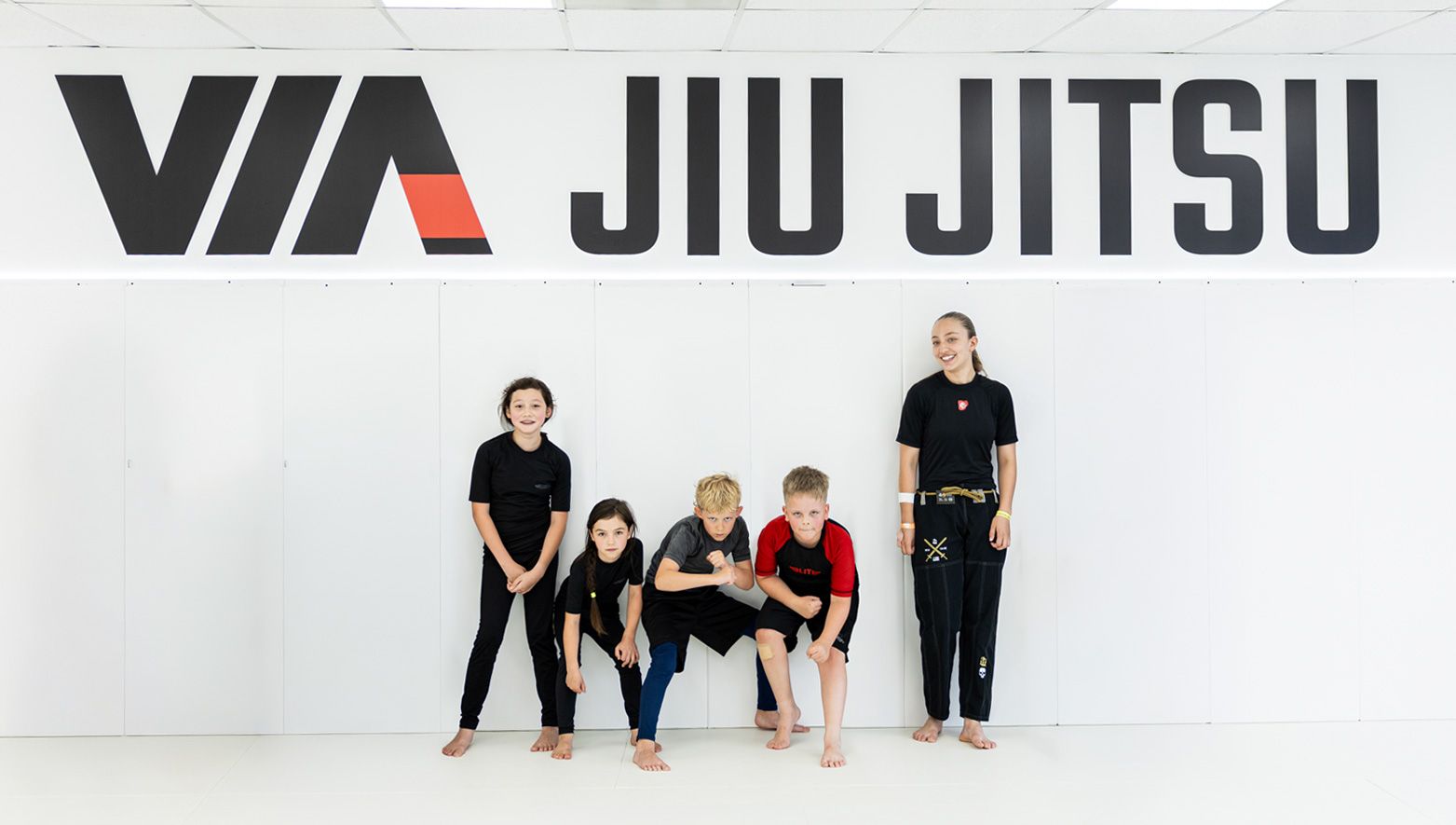 Kids posing no-gi jiu-jitsu at Via Jiu Jitsu