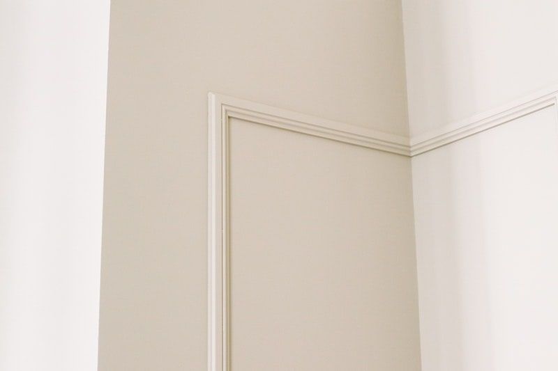 A closeup of the corner and edges of a room with a smooth finish