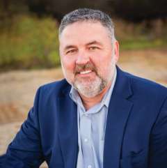 Brad Bruna, Chief Operating Officer