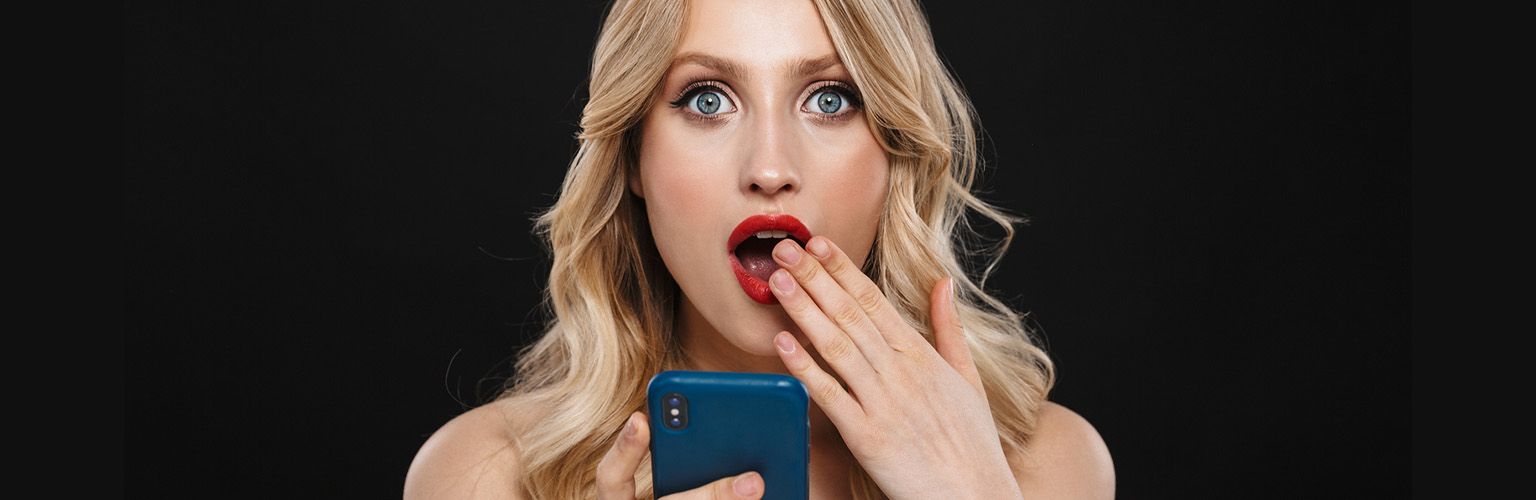 What to Say on Adult Phone Chat - An adult chat lady, with a shocked expression.