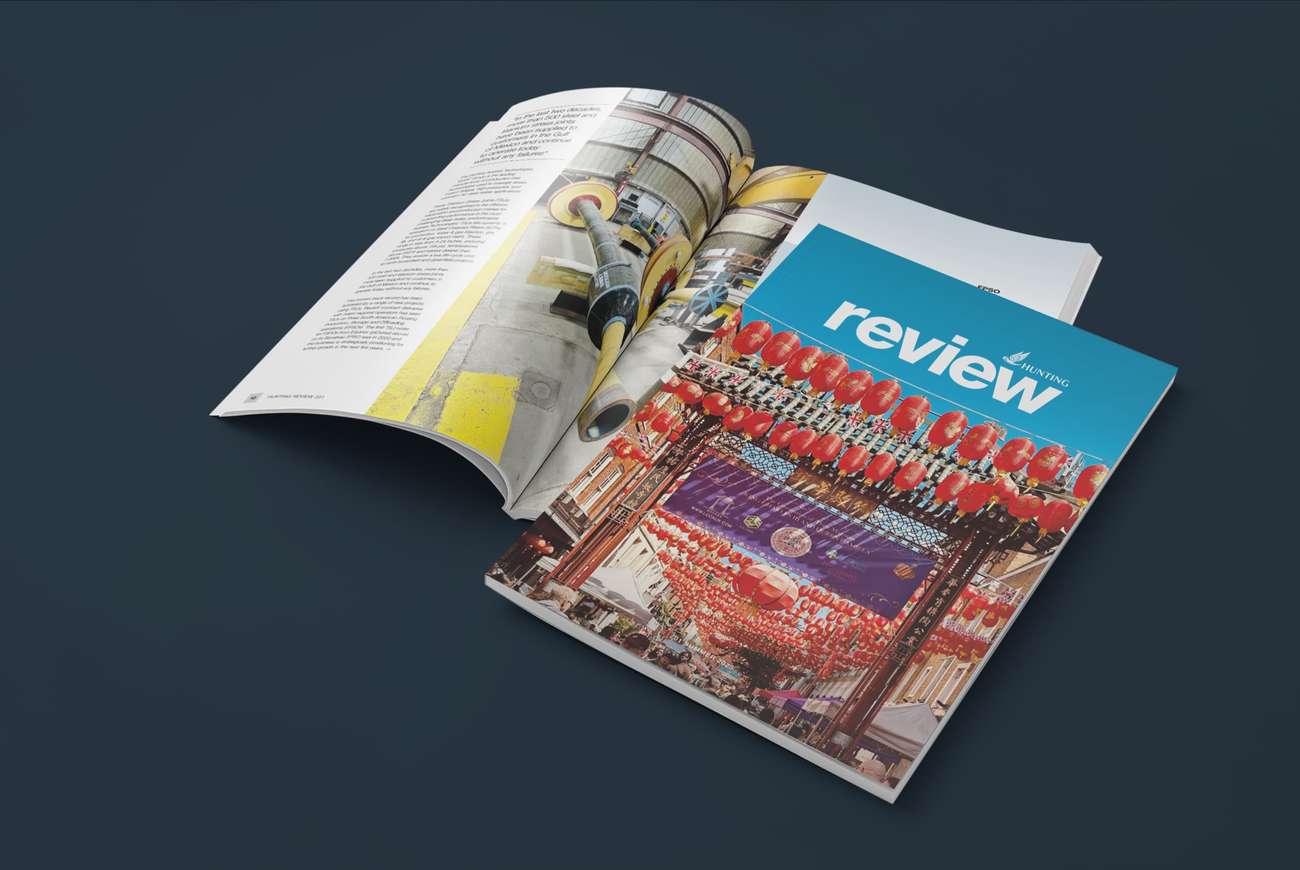 Opened A4 booklet of Hunting Review