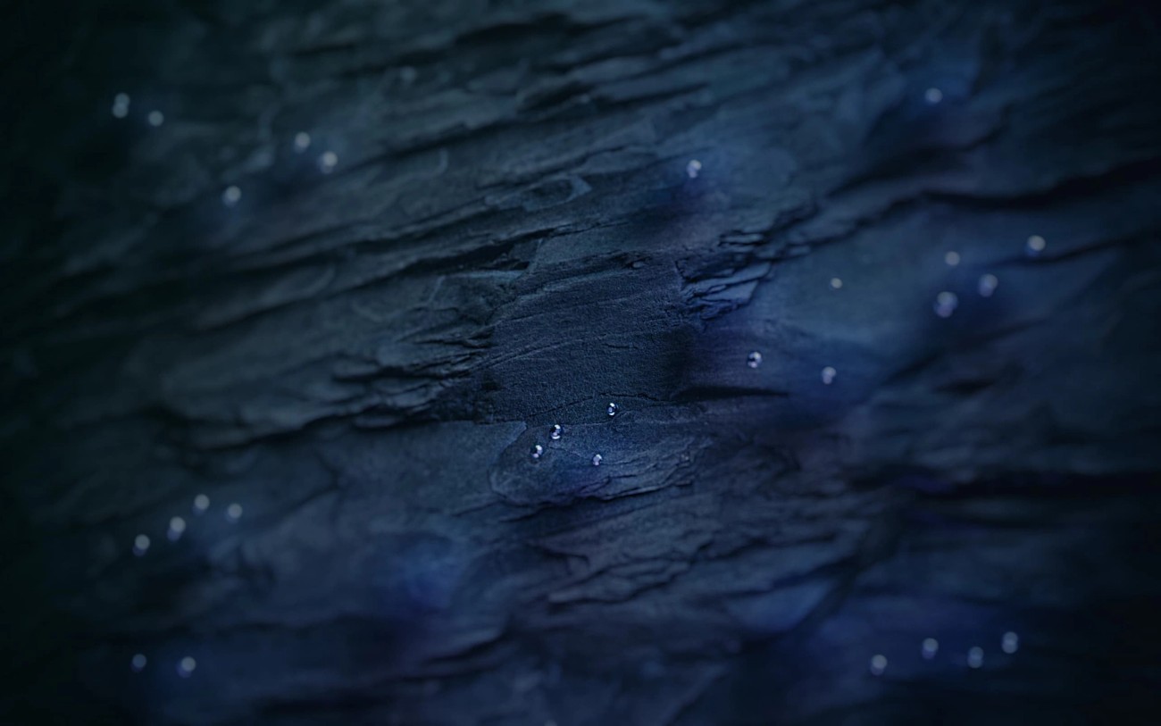 Abstract rendering of rock and oil drops under water