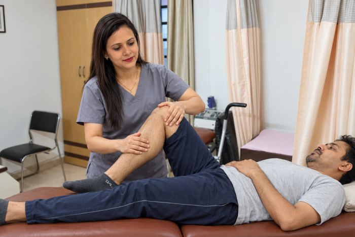 Illustrative physiotherapy scene based on the clinic room, showing a knee movement assessment