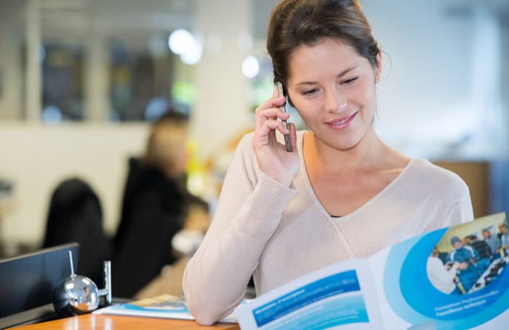 Woman reading a brochure
